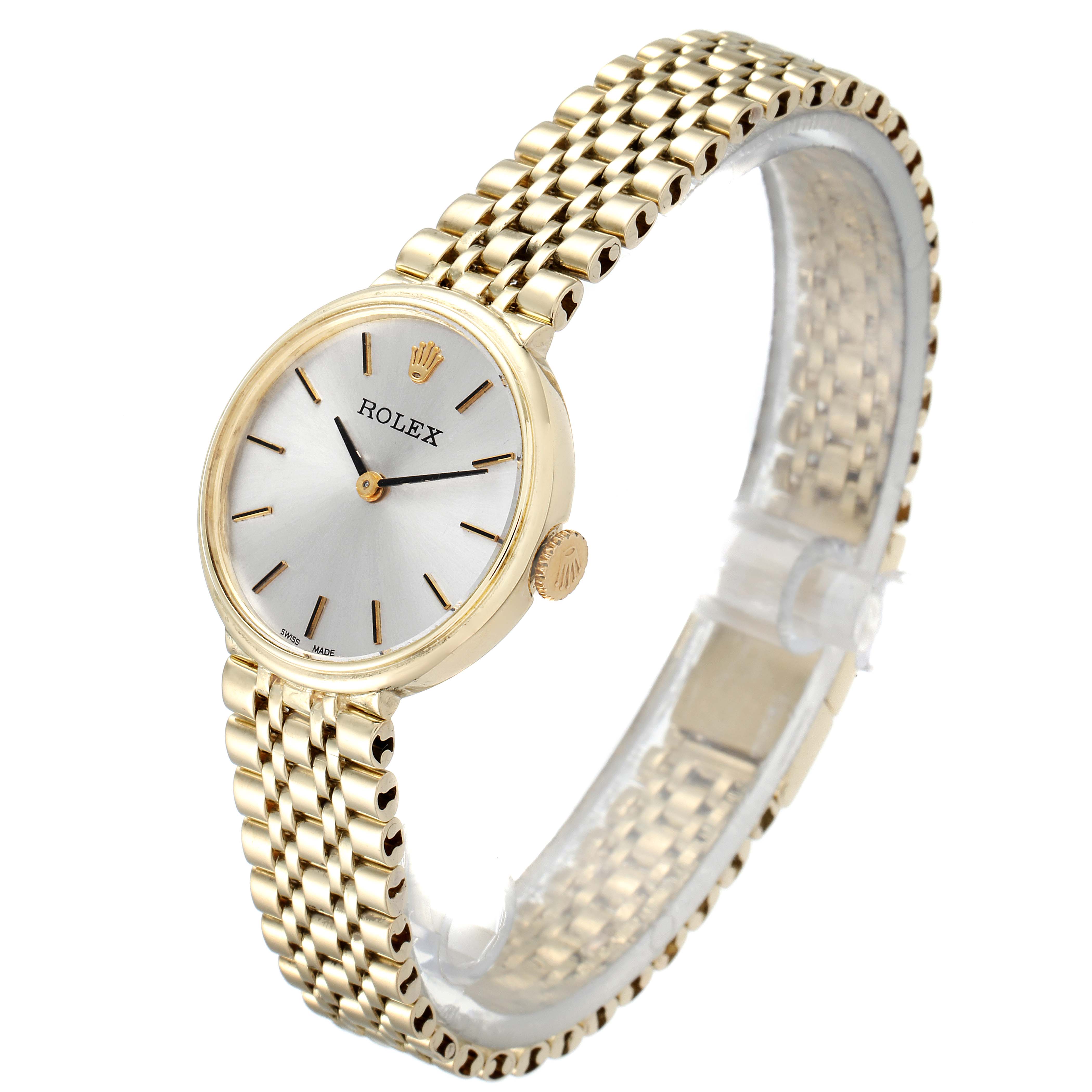 The Rolex Cocktail  Women's Yellow Gold Silver Dial  Women's Yellow Gold Silver Dial model watch is shown from a three-quarter angle, highlighting its face, bezel, crown, and bracelet.
