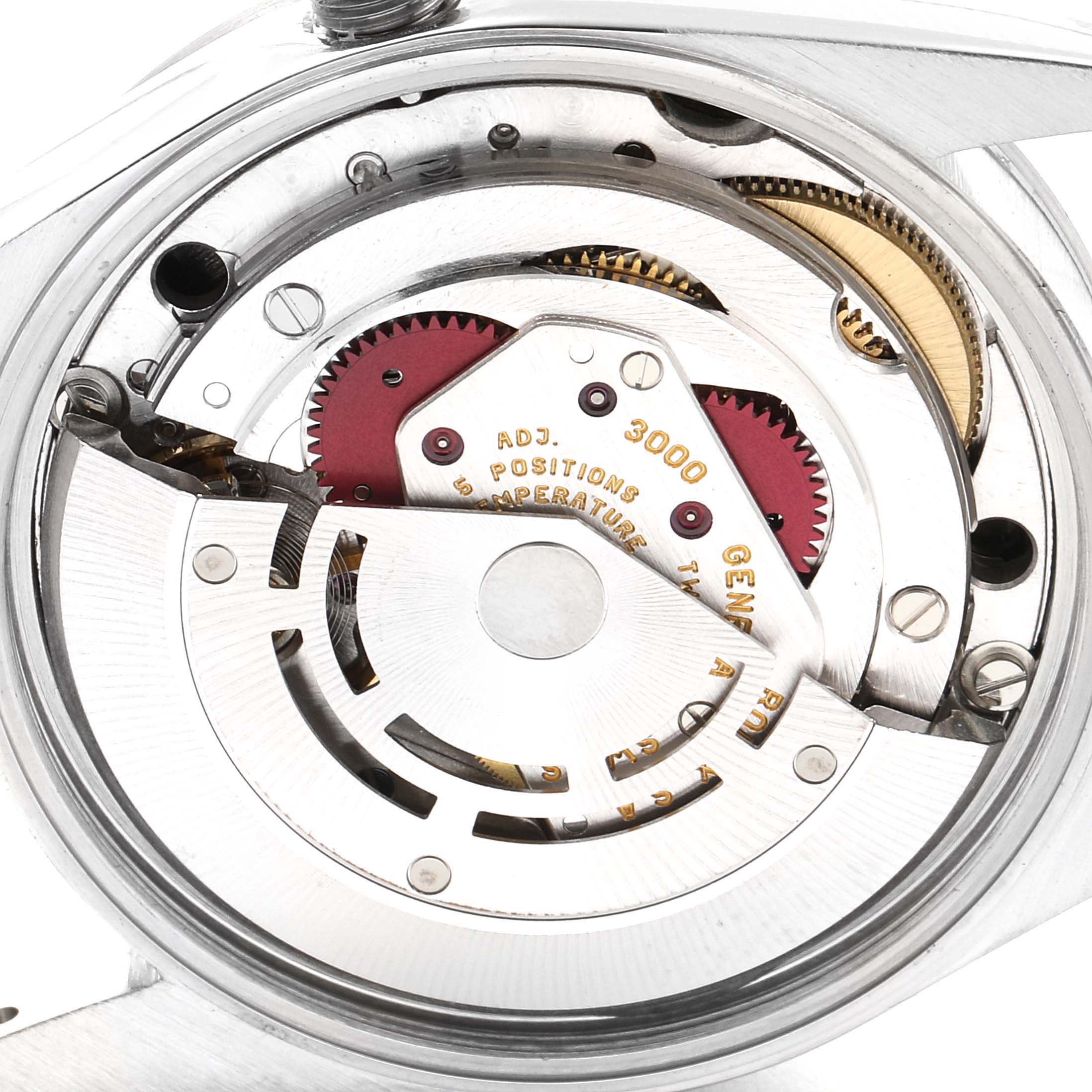 This image shows the Rolex Air-King 14000 Men's Stainless Steel Black Dial 14000 Men's Stainless Steel Black Dial watch's movement, displaying gears and internal components from a close-up, top-down angle.