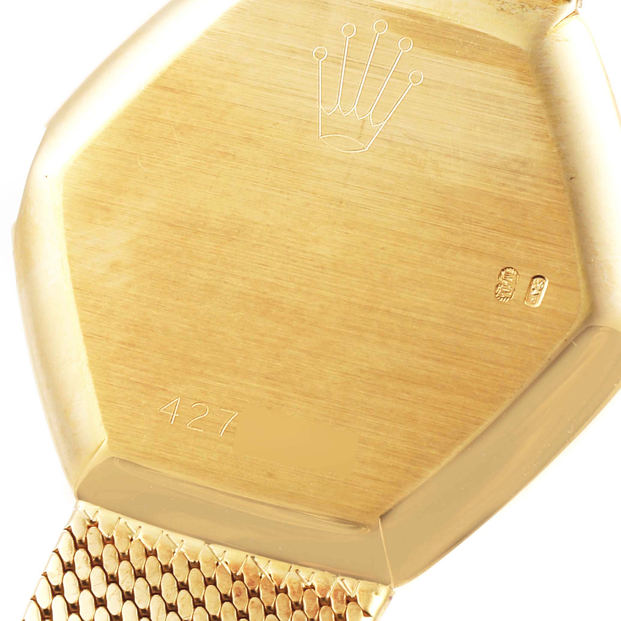 The image shows the back case of a Rolex Cellini 4303 Women's Yellow Gold Brown Dial 4303 Women's Yellow Gold Brown Dial watch, highlighting the engraved crown logo and the serial number.