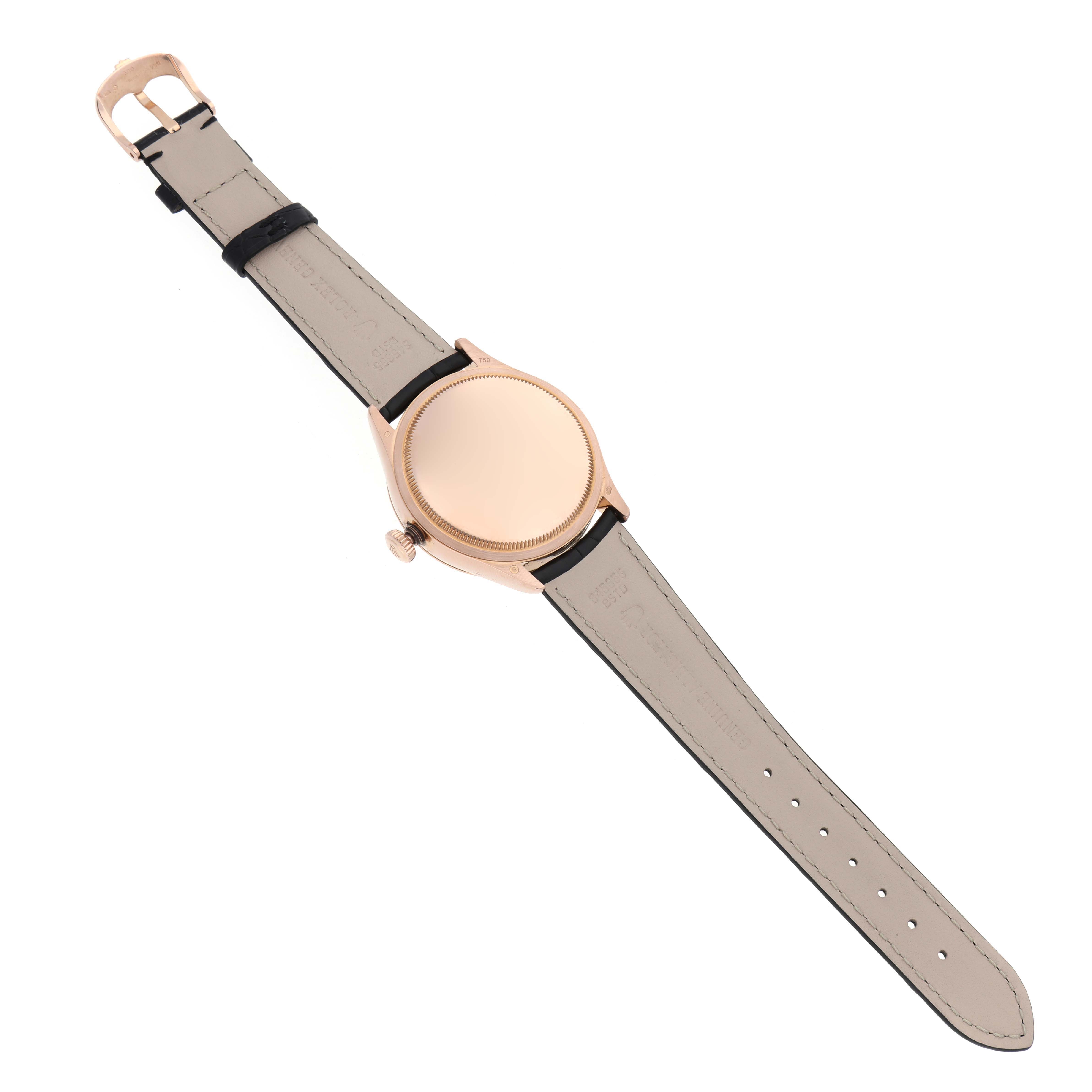 The image shows a top view of the back and strap of a Rolex Cellini 50515 Men's Rose Gold Silver Dial 50515 Men's Rose Gold Silver Dial watch.