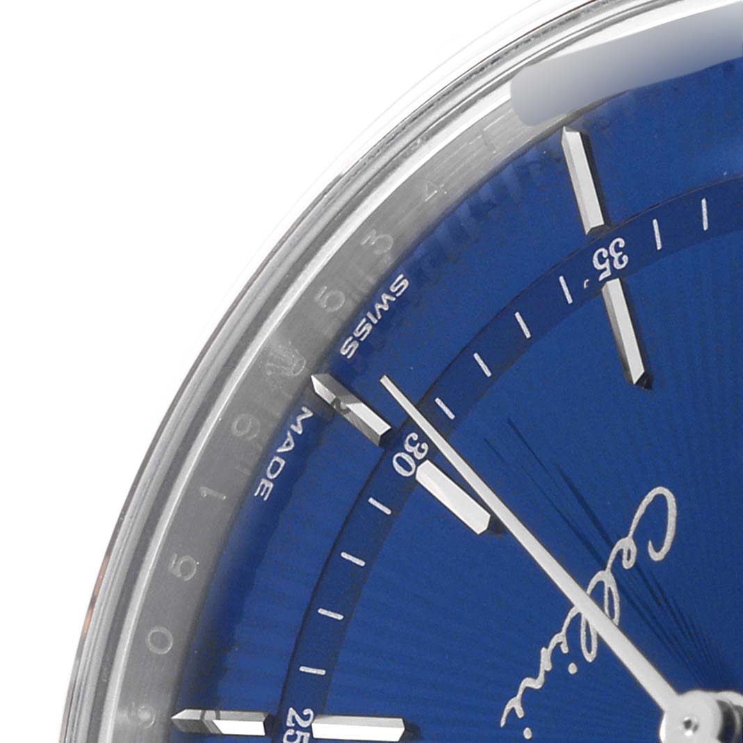 The image shows a close-up of the dial of a Rolex Cellini 50519 Men
s White Gold Blue Dial 50519 Men
s White Gold Blue Dial model, highlighting its blue face and partial numbering.
