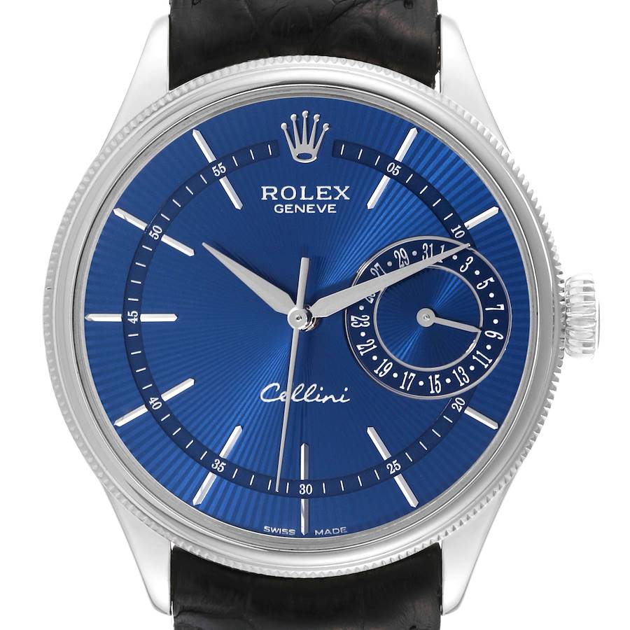 The image shows the front view of a Rolex Cellini watch with a blue dial, including hour, minute, and date subdial displays.