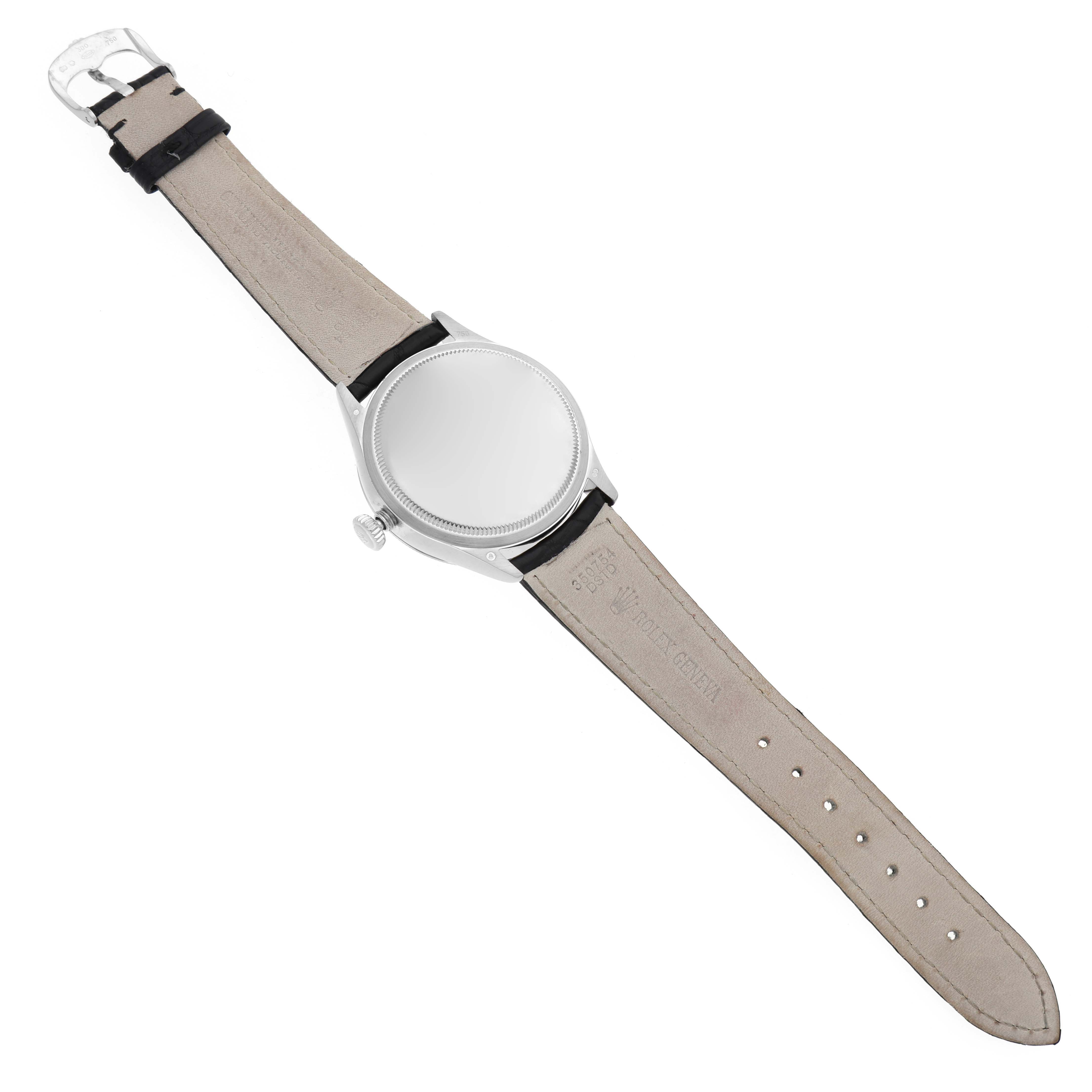 The image shows a Rolex Cellini 50519 Men's White Gold Blue Dial 50519 Men's White Gold Blue Dial watch from a top-down angle, displaying the wristband, case back, and crown.