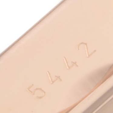 This image shows an engraved number on the side case of a Rolex Cellini 5442/5 Men's Rose Gold Black Dial 5442/5 Men's Rose Gold Black Dial watch.