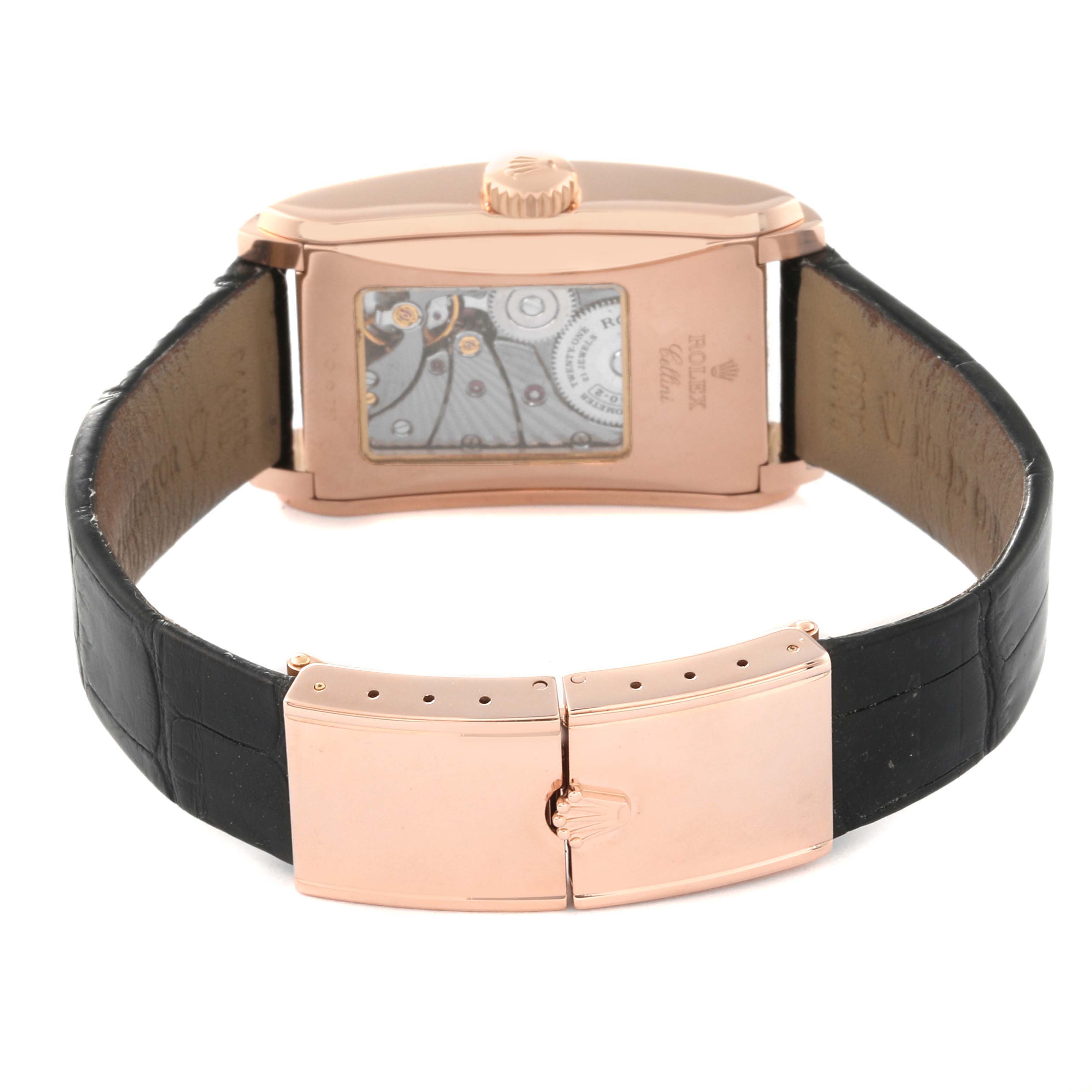 The image shows the back side of a Rolex Cellini 5442/5 Men's Rose Gold Black Dial 5442/5 Men's Rose Gold Black Dial watch with its clasp and visible movement through a transparent case back.