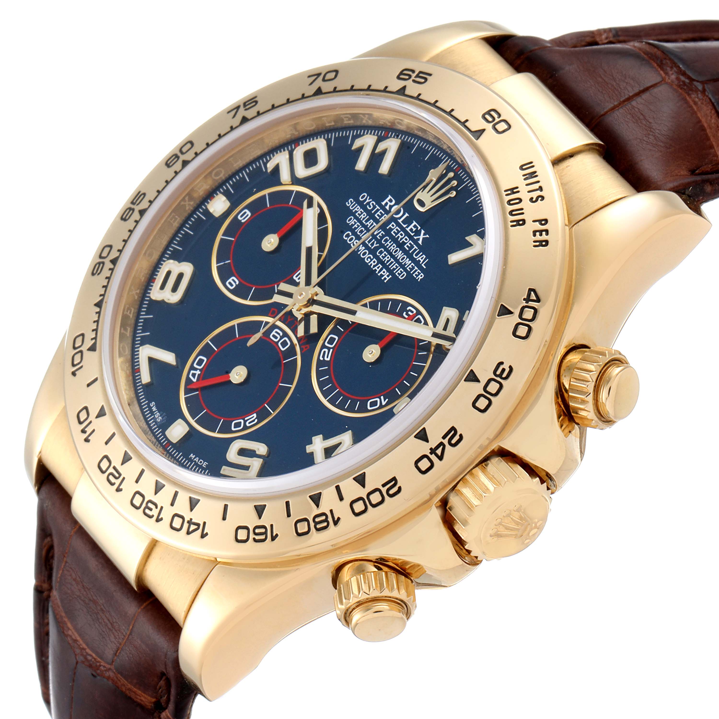 The Rolex Daytona 116518 Men's Yellow Gold Blue Dial 116518 Men's Yellow Gold Blue Dial watch is shown at an oblique angle, featuring its gold case, blue dial, chronograph subdials, and brown leather strap.