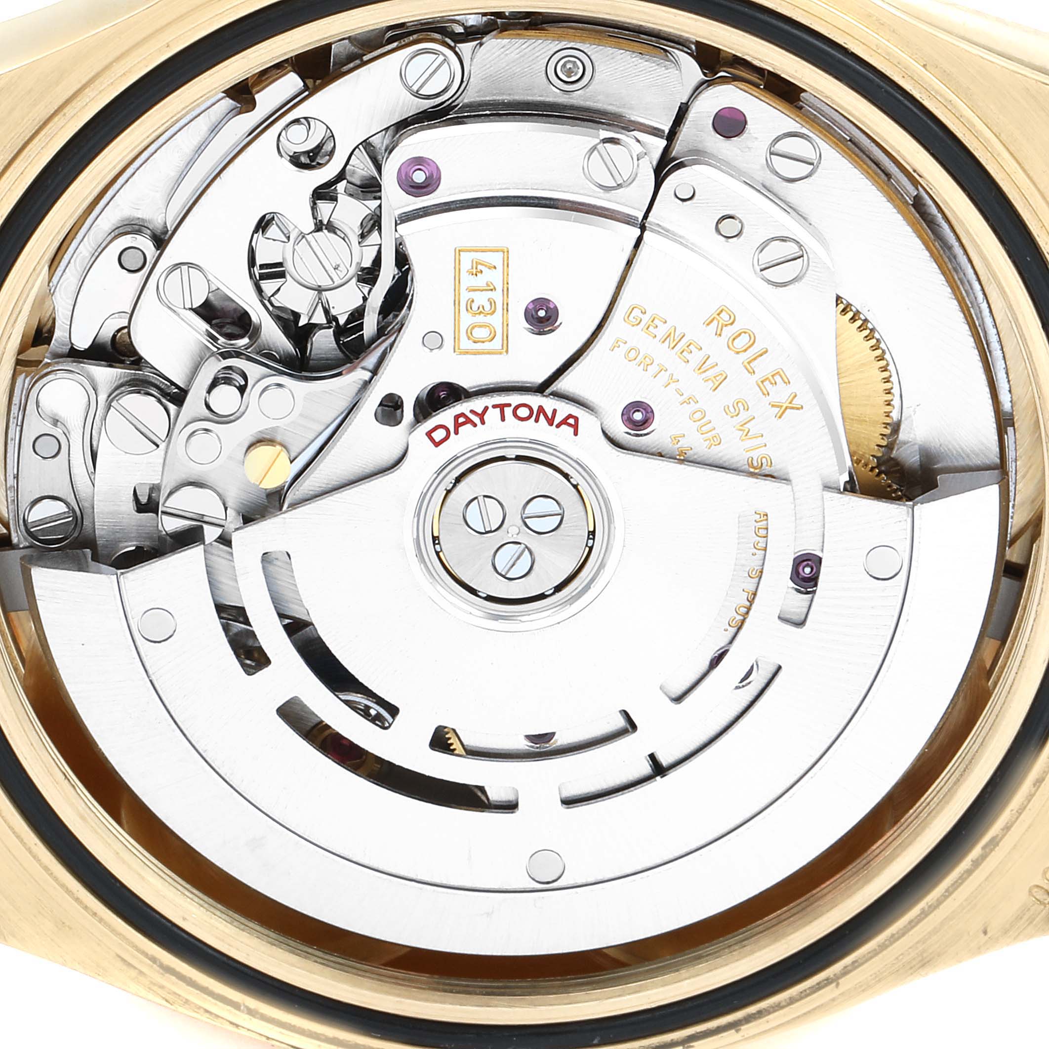 This shows the movement and internal components of a Rolex Daytona 116518 Men's Yellow Gold Blue Dial 116518 Men's Yellow Gold Blue Dial watch from a rear angle view.