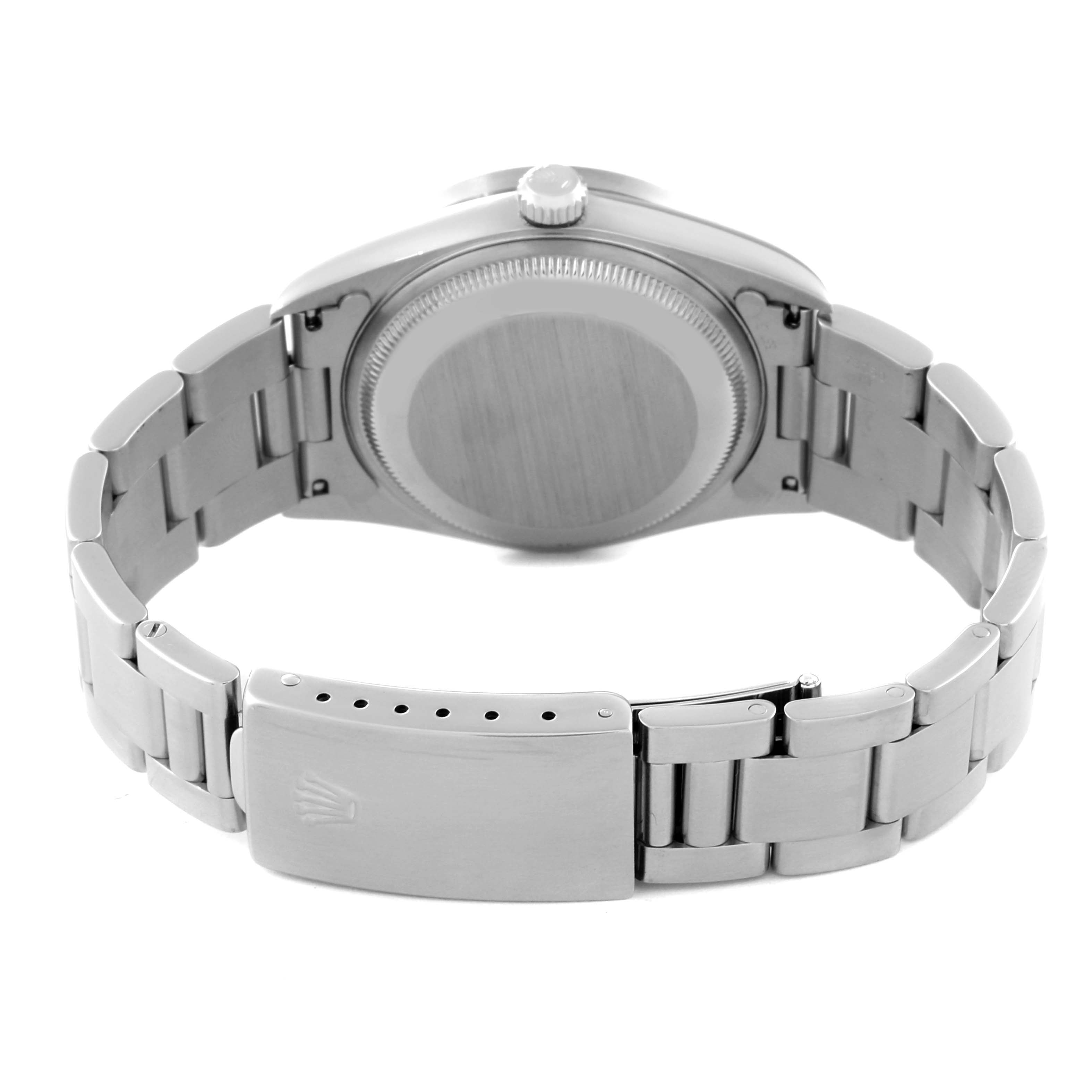 The image shows the back of a Rolex Date 15210 Men
s Stainless Steel Grey Dial 15210 Men
s Stainless Steel Grey Dial model watch, highlighting the case back, bracelet, and clasp.