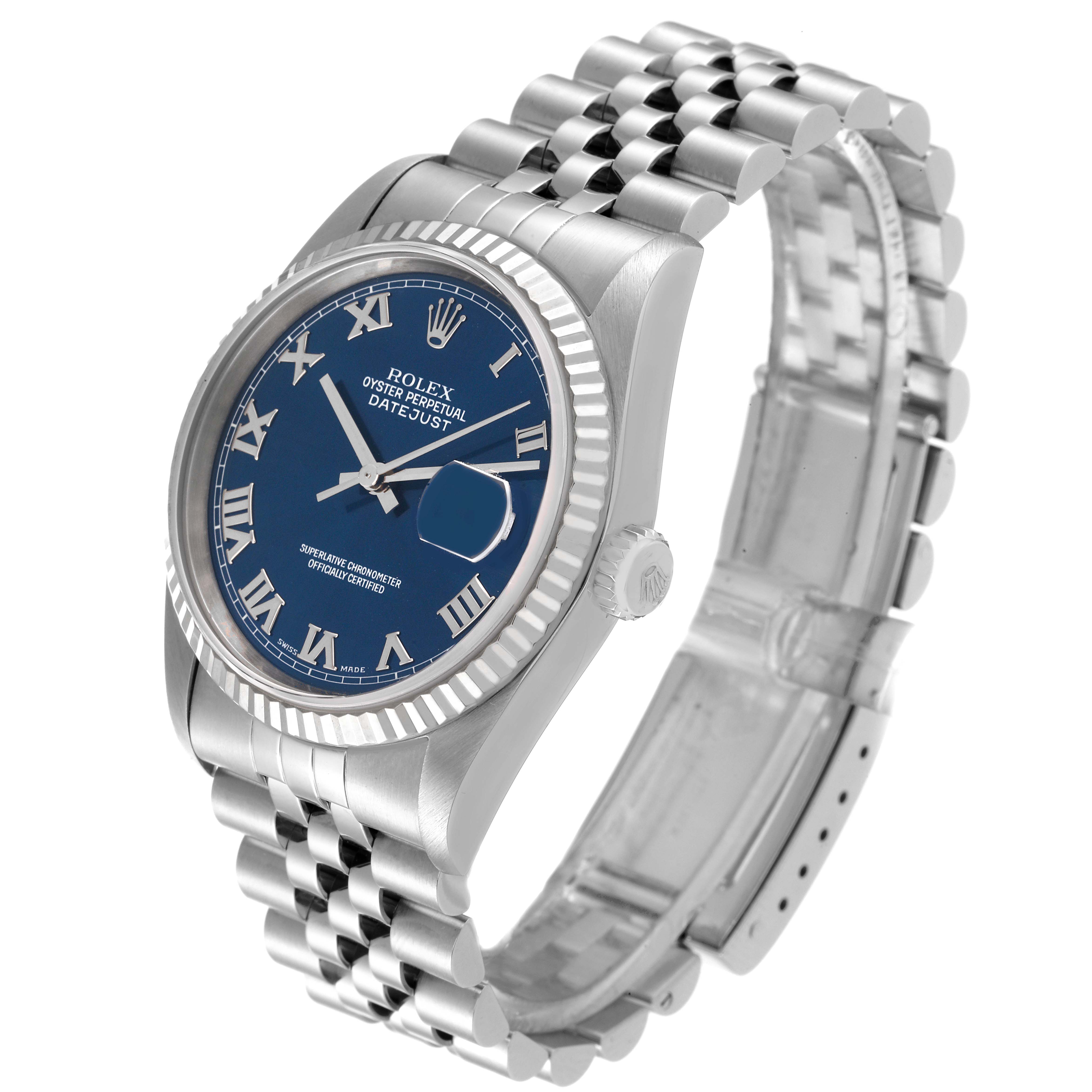 This image shows a Rolex Datejust 16234 Men's Stainless Steel Blue Dial 16234 Men's Stainless Steel Blue Dial watch from an angled view, highlighting its blue dial, fluted bezel, and jubilee bracelet.