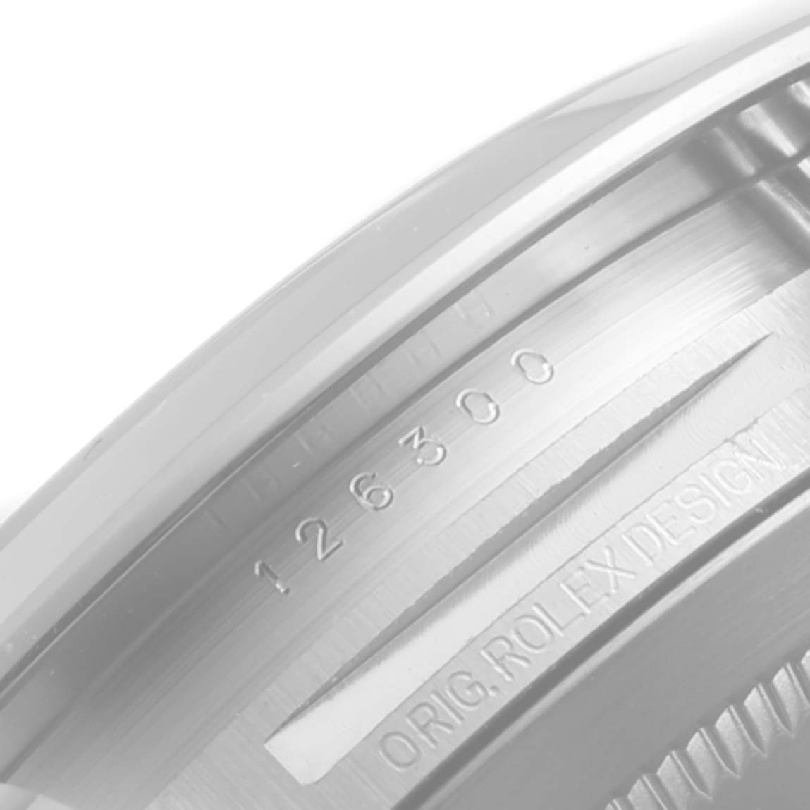 The image shows a close-up of the engraved serial and model numbers on the case of a Rolex Datejust 41 126300 Men's Stainless Steel Blue Dial 126300 Men's Stainless Steel Blue Dial.