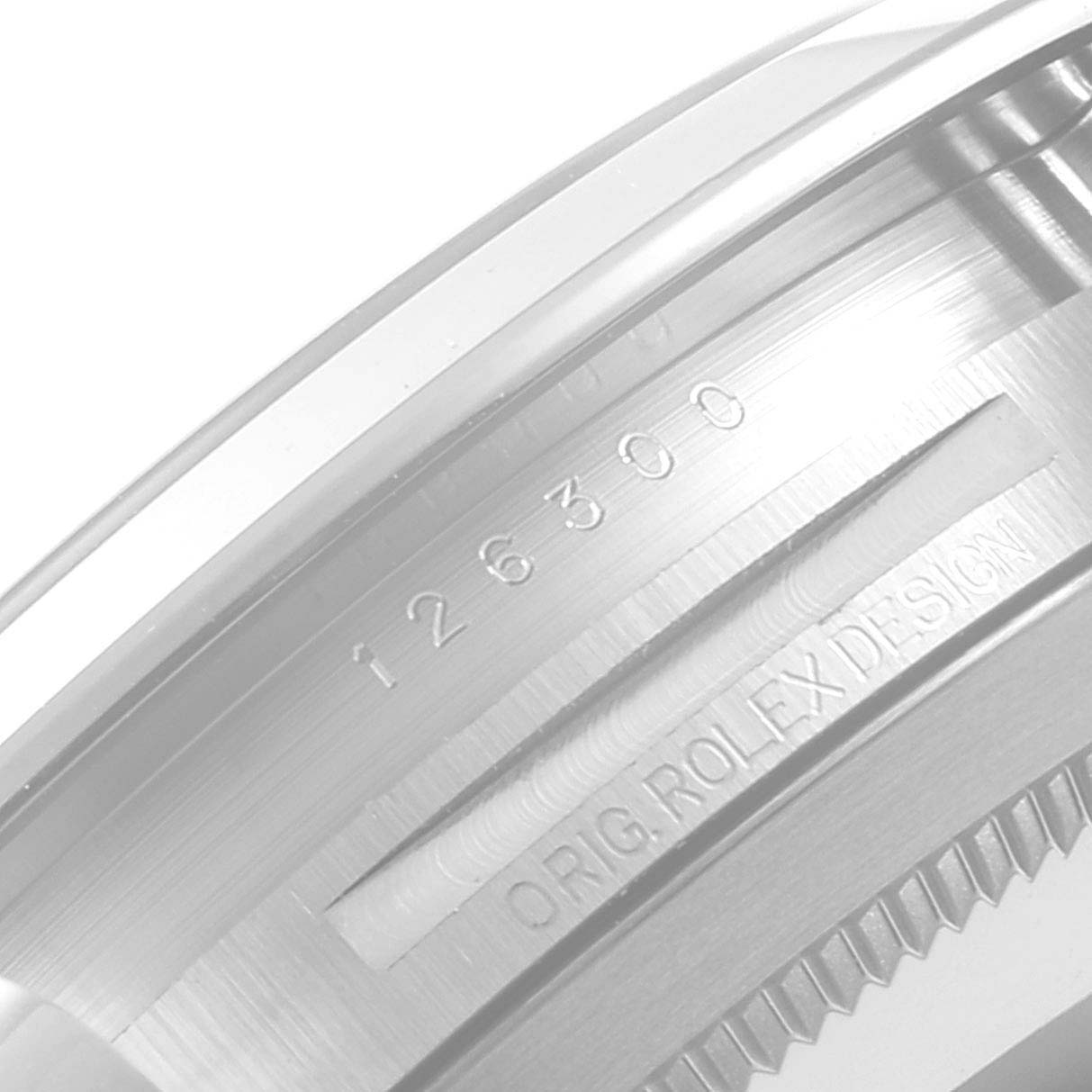 This is a close-up image of the case side of the Rolex Datejust 41 126300 Men
s Stainless Steel Blue Dial 126300 Men
s Stainless Steel Blue Dial model, displaying the reference number "126300" and "ORIG. ROLEX DESIGN" engraving.