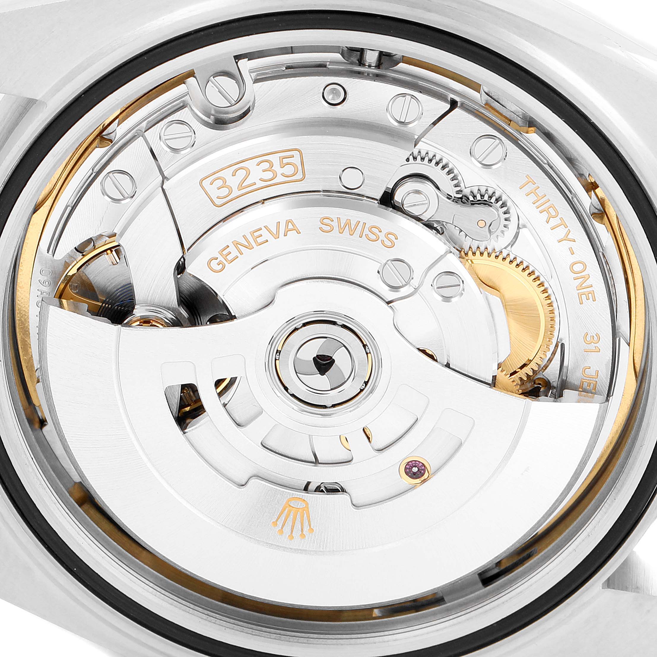 This image shows the movement of a Rolex Datejust 41 126300 Men
s Stainless Steel Blue Dial 126300 Men
s Stainless Steel Blue Dial model, highlighting the intricate mechanical components from the back.