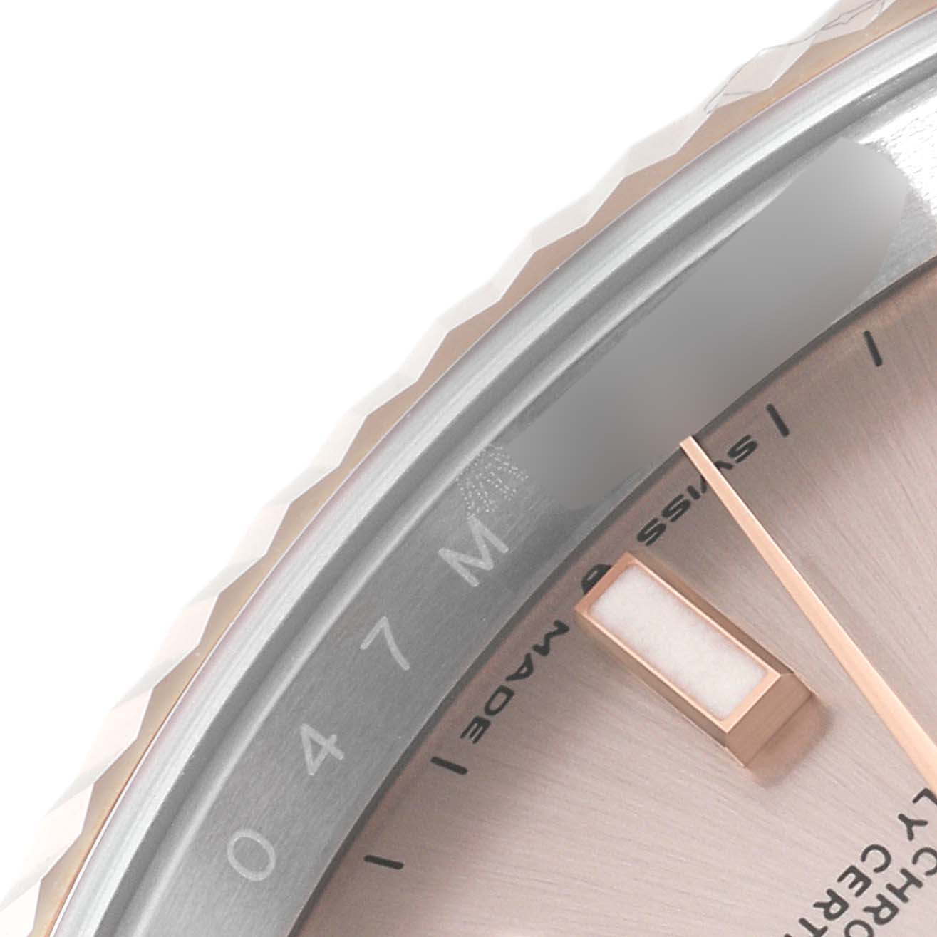 This is a close-up view of the dial and bezel of the Rolex Datejust 41 126331 Men's Steel and Gold (two tone) Beige Dial 126331 Men's Steel and Gold (two tone) Beige Dial watch.