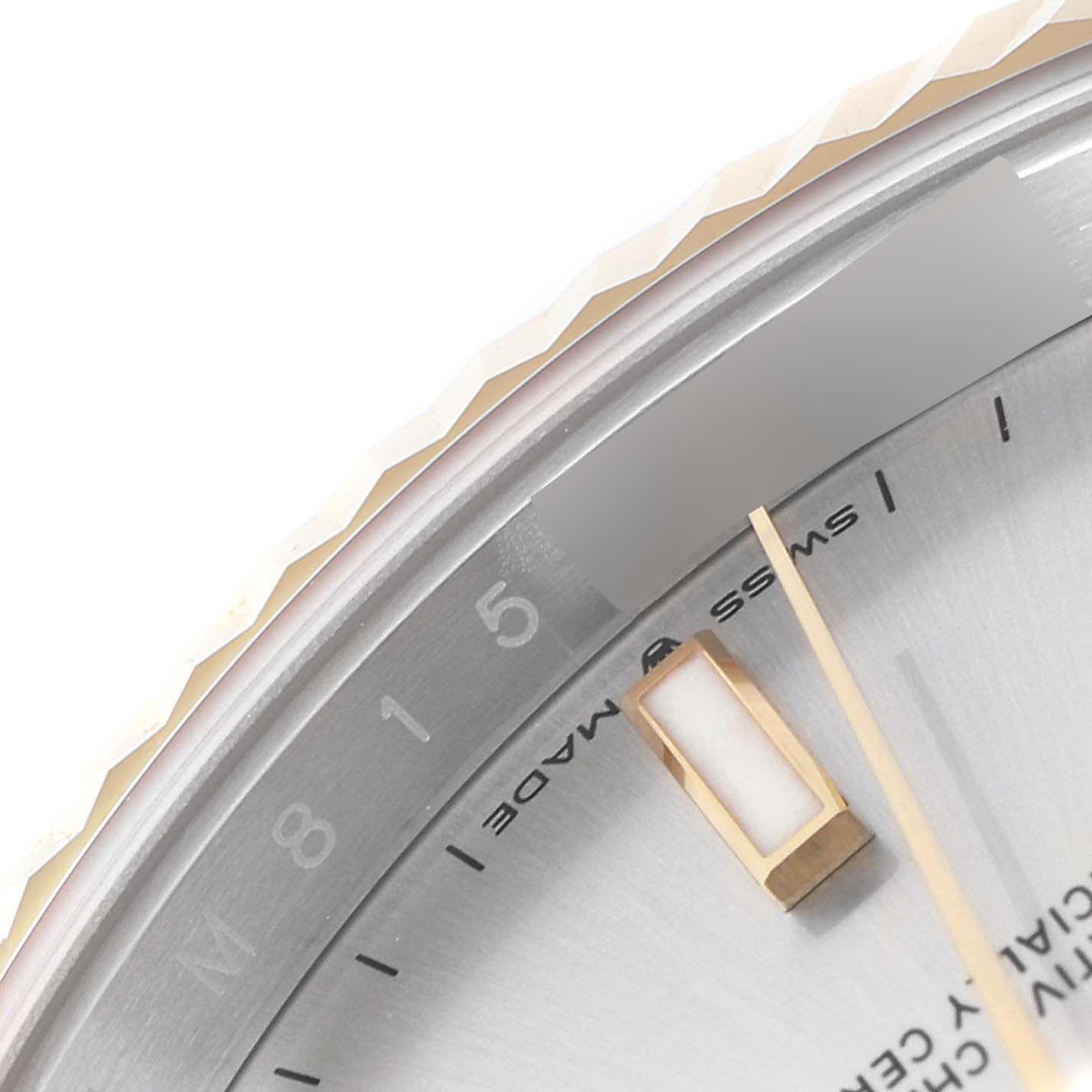This image shows a close-up of the dial, bezel, and one of the hour markers of the Rolex Datejust 41 126333 Men
s Steel and Gold (two tone) Silver Dial 126333 Men
s Steel and Gold (two tone) Silver Dial watch.