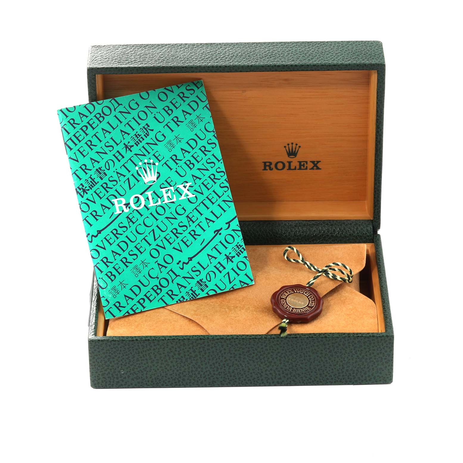 The image shows the open packaging box for a Rolex Datejust 16234 Men's Stainless Steel Silver Dial 16234 Men's Stainless Steel Silver Dial, containing a manual and a tag.