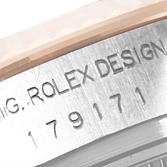 The image shows a close-up of the case side of a Rolex Datejust 179171 Women
s Steel and Gold (two tone) Black Dial 179171 Women
s Steel and Gold (two tone) Black Dial, revealing the engraved model number.