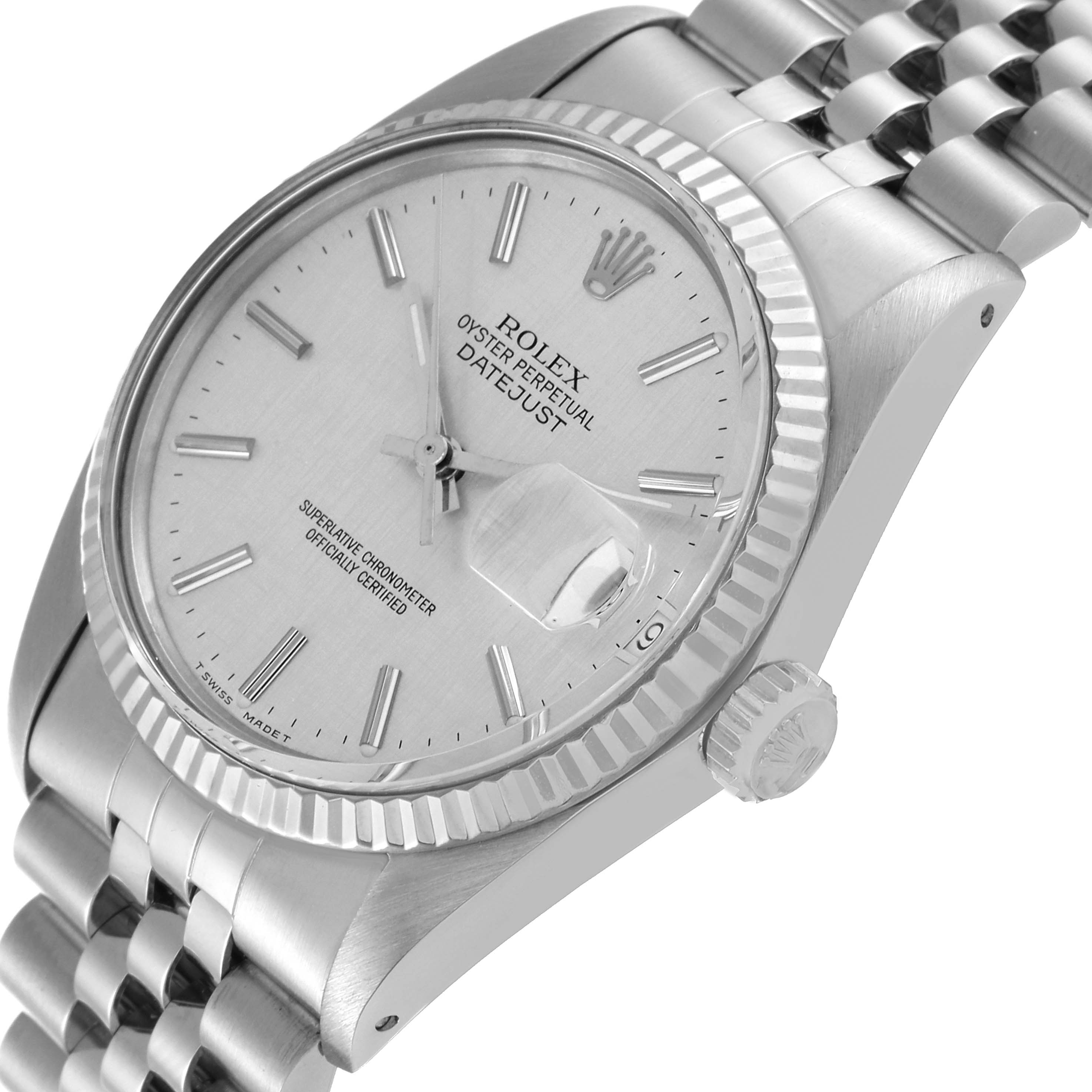 The image shows a side angle of the Rolex Vintage Collection 16014 Men's Stainless Steel Silver Dial 16014 Men's Stainless Steel Silver Dial Oyster Perpetual Datejust, highlighting the face, bezel, crown, and bracelet.