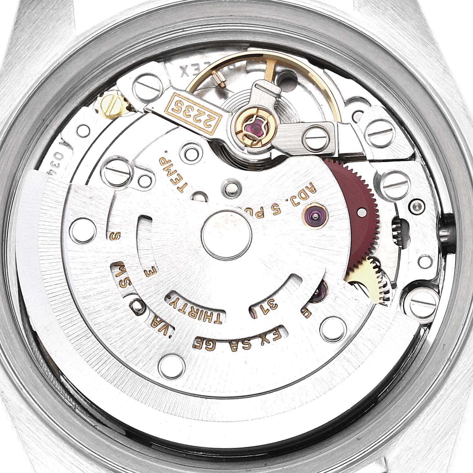 This image shows a close-up view of the movement mechanism of a Rolex Datejust 79173 Women's Steel and Gold (two tone) Champagne Dial 79173 Women's Steel and Gold (two tone) Champagne Dial watch.