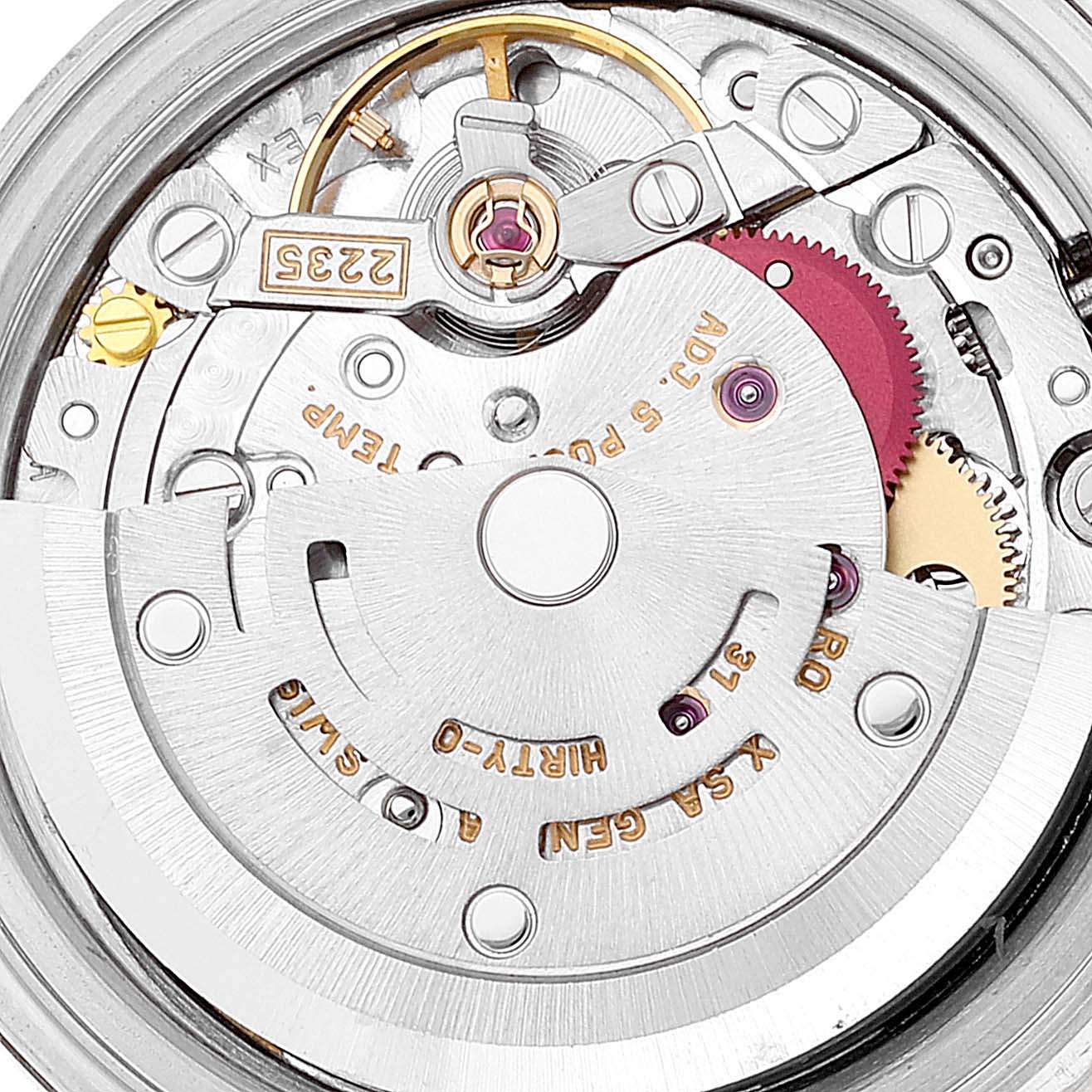 The image shows a close-up view of the internal mechanism of a Rolex Datejust 79173 Women's Steel and Gold (two tone) White Dial 79173 Women's Steel and Gold (two tone) White Dial watch, focusing on its movement components.