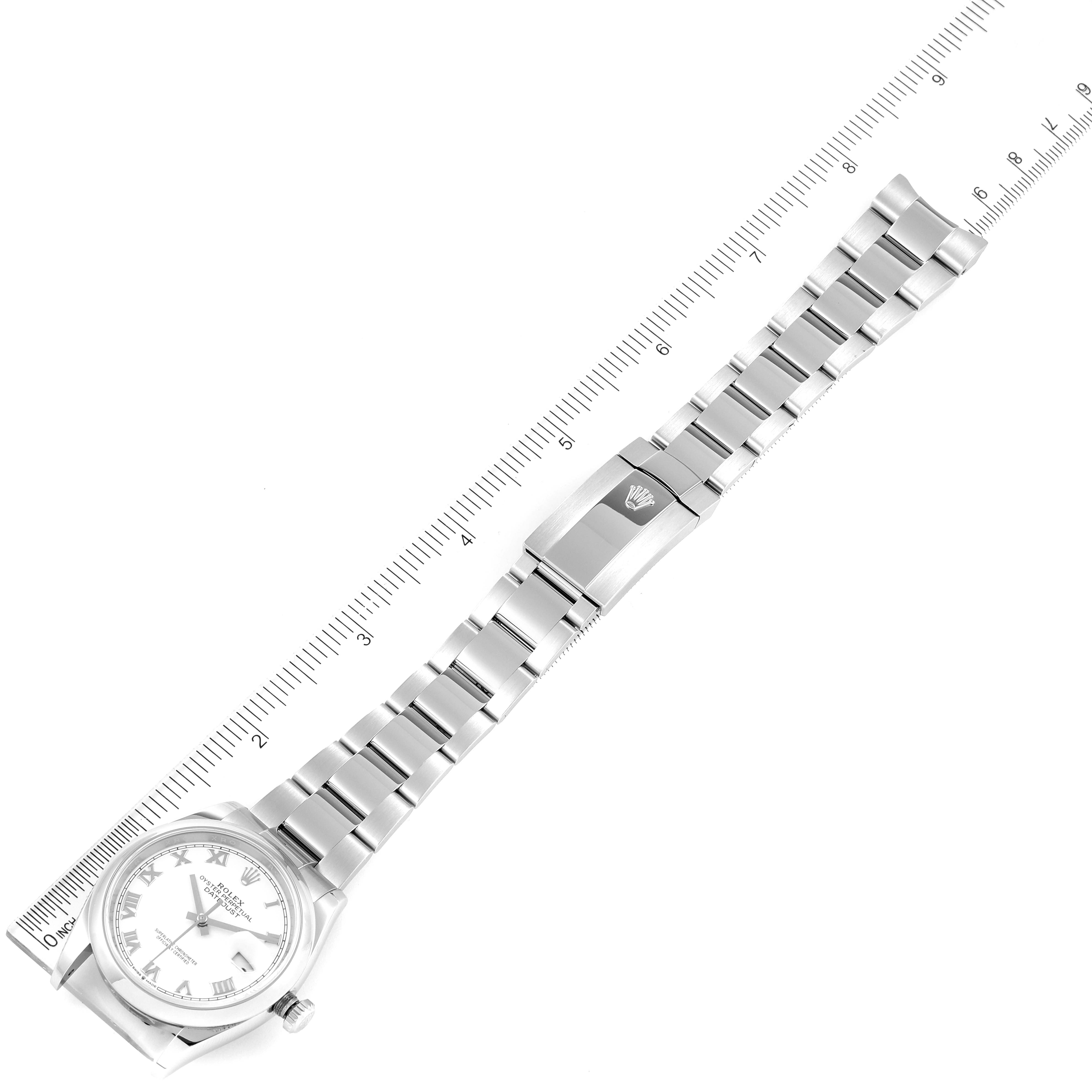 The Rolex Datejust 126200 Men's Stainless Steel White Dial 126200 Men's Stainless Steel White Dial watch is shown from an overhead angle, featuring the full length of the bracelet and the face of the watch.