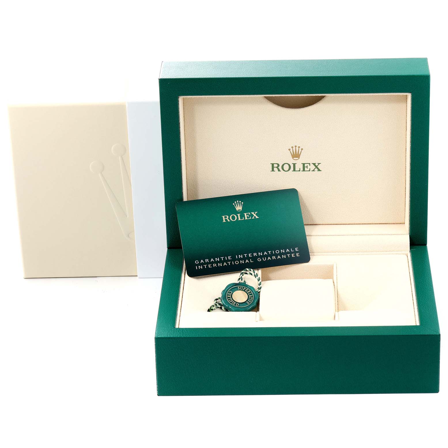 This image shows the open packaging for a Rolex Datejust 126200 Men's Stainless Steel White Dial 126200 Men's Stainless Steel White Dial watch, including the box, international guarantee card, and tag.