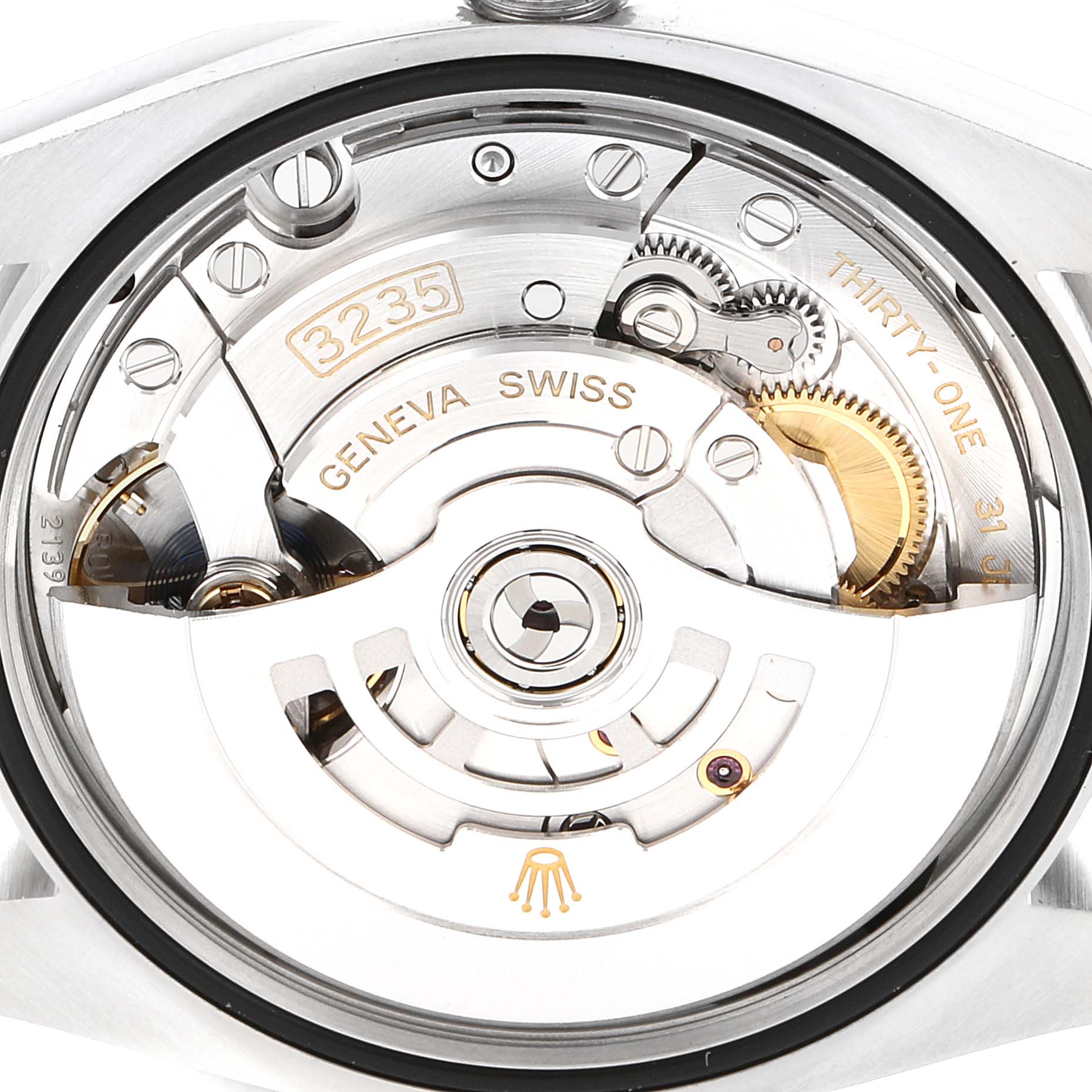 This image shows the movement of a Rolex Datejust 126200 Men's Stainless Steel White Dial 126200 Men's Stainless Steel White Dial watch, highlighting the rotor, gears, and intricate mechanical components.
