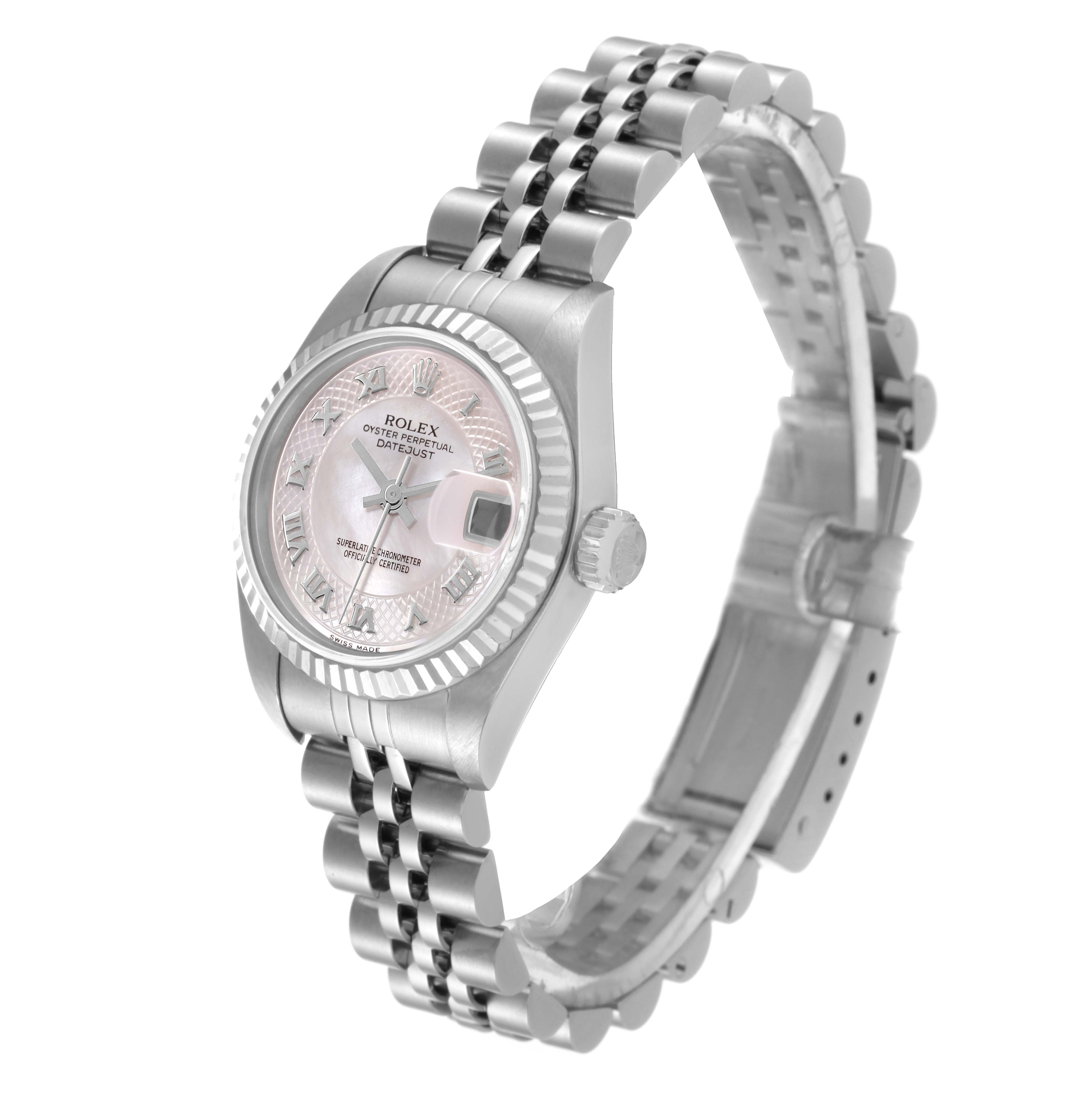 This image shows a Rolex Datejust 79174 Women's Stainless Steel Mother of Pearl Dial 79174 Women's Stainless Steel Mother of Pearl Dial watch at a three-quarter angle highlighting its dial, bezel, crown, and bracelet.