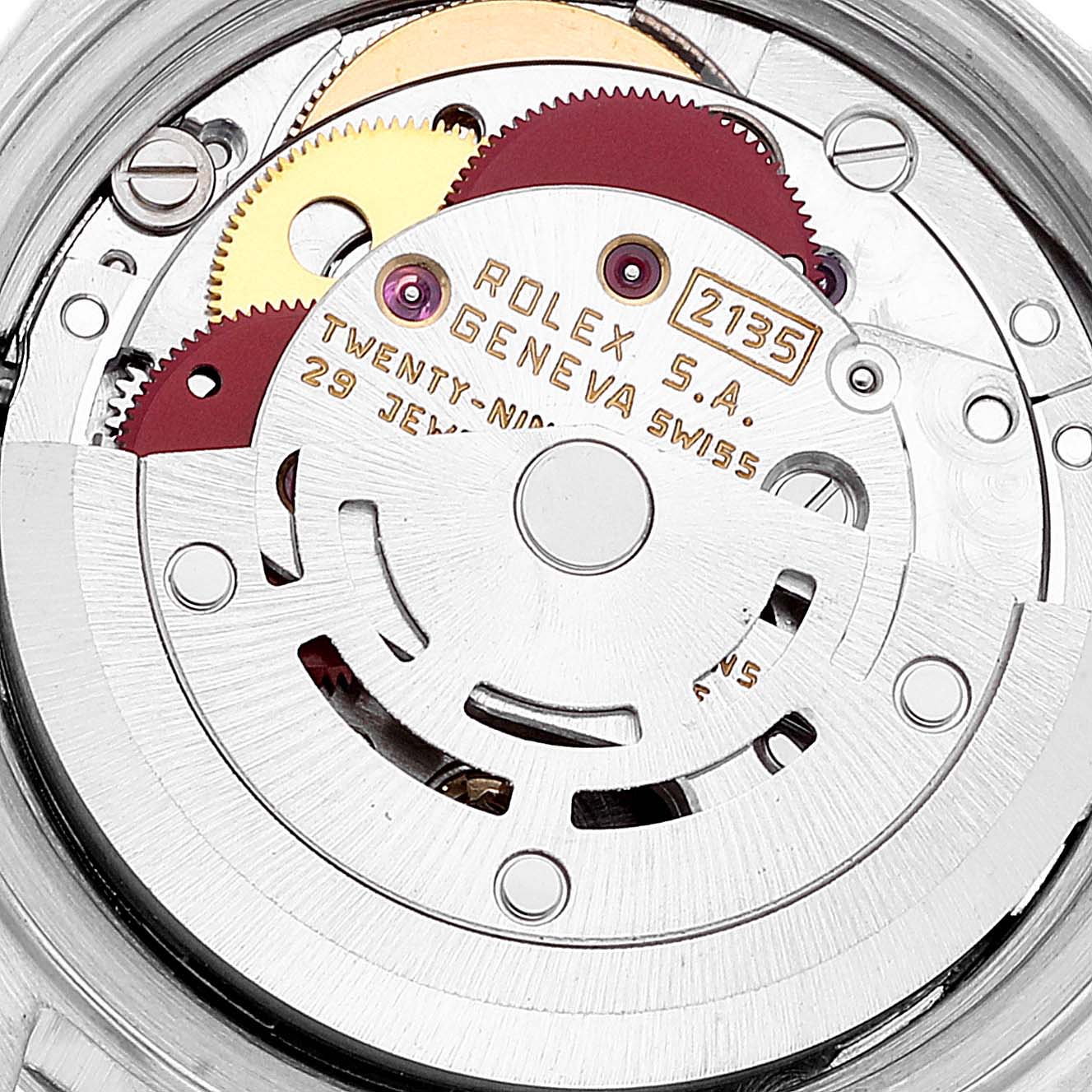 This image shows the internal mechanical movement of a Rolex Datejust 69174 Women's Stainless Steel Silver Dial 69174 Women's Stainless Steel Silver Dial watch, focusing on the gears and inscription on the rotor.