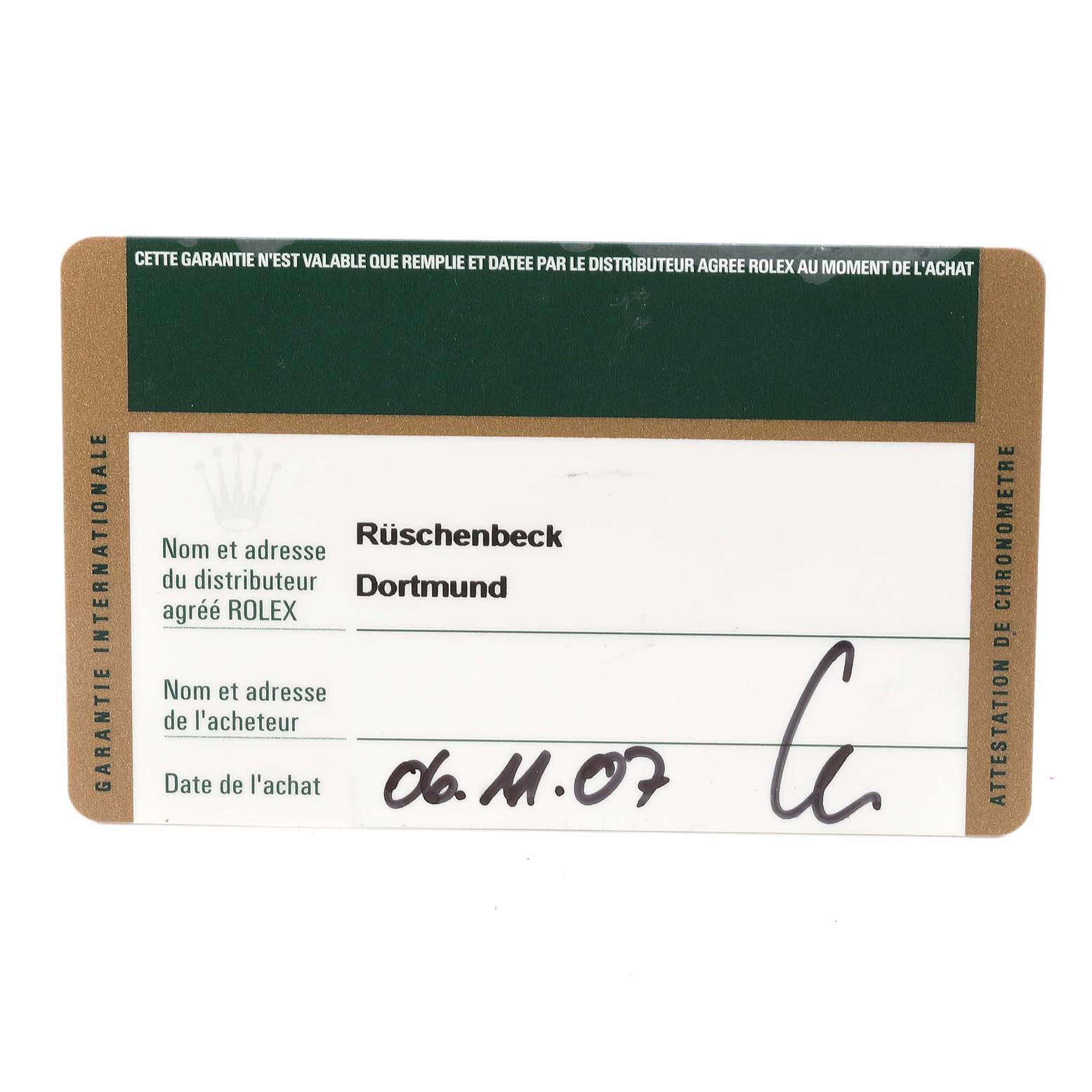 This image shows the guarantee card for a Rolex Daytona 116528 Men
s Yellow Gold Mother of Pearl Dial 116528 Men
s Yellow Gold Mother of Pearl Dial watch with dealer and purchase details filled in.