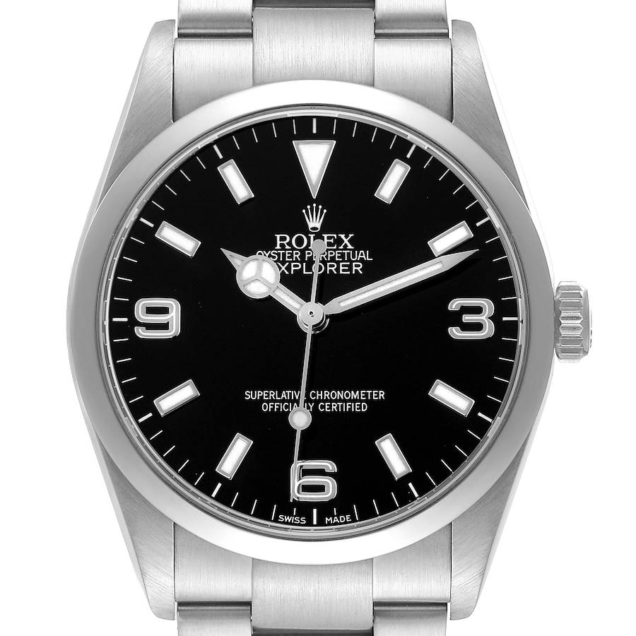 The Rolex Explorer watch is shown from the front, highlighting the black dial, numerals, hands, and crown.