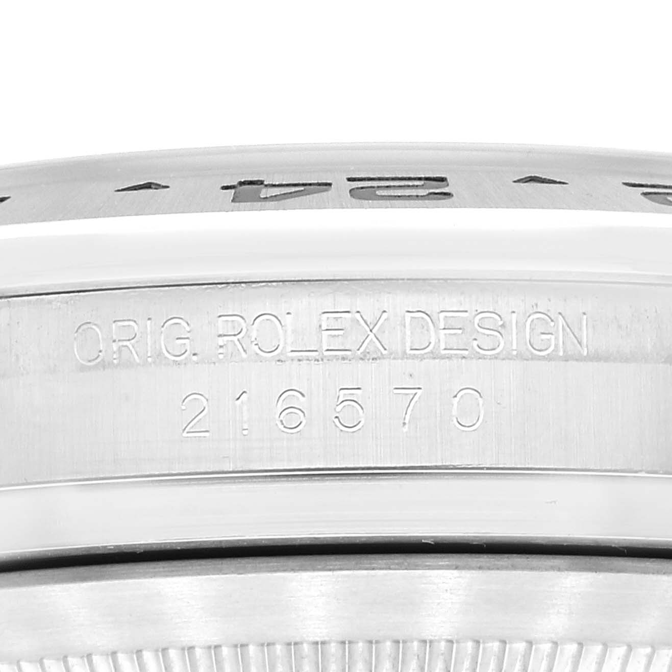 The image shows the side view of a Rolex Explorer 216570 Men
s Stainless Steel Black Dial 216570 Men
s Stainless Steel Black Dial watch case, highlighting the engraved model number 216570.