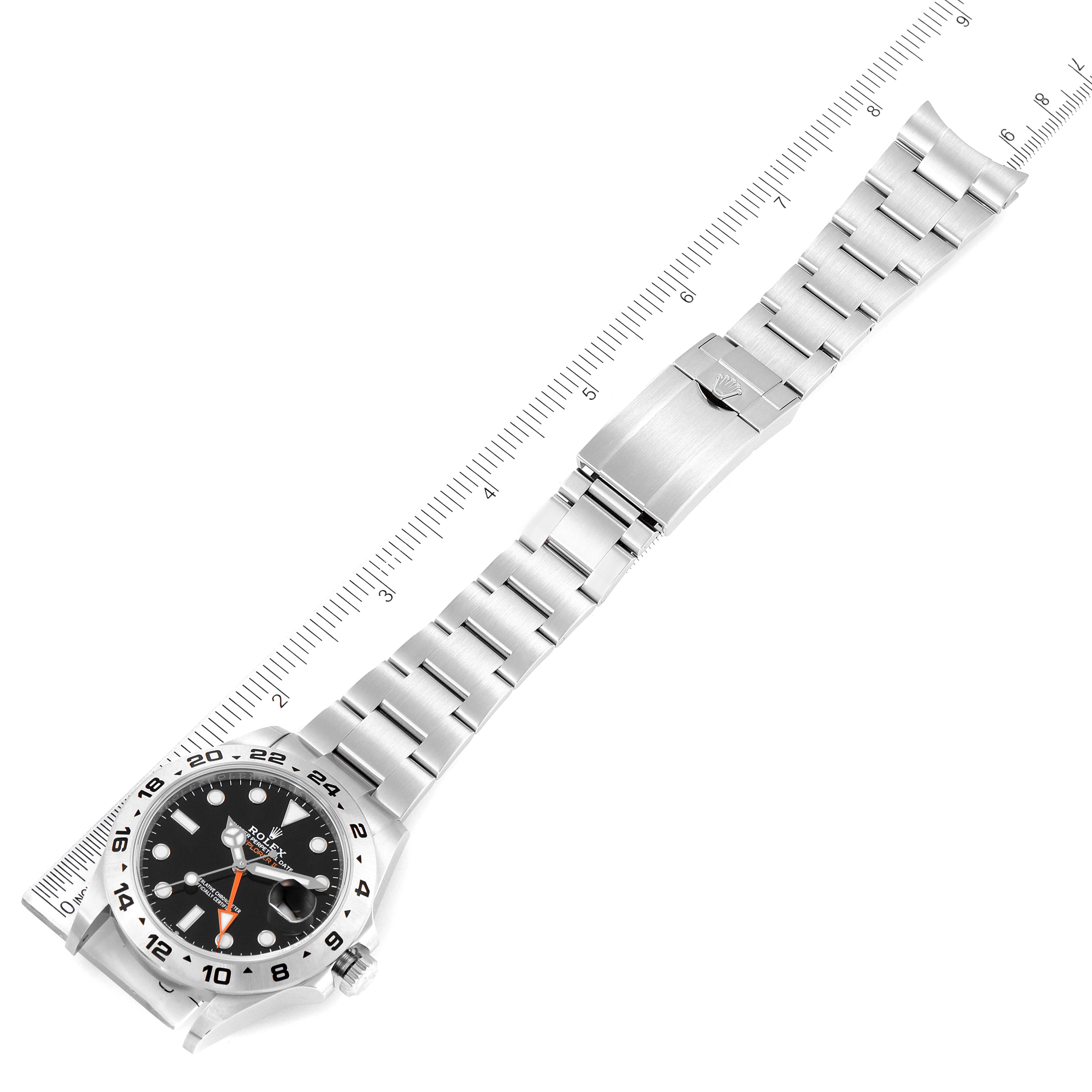 The Rolex Explorer 226570 Men's Stainless Steel Black Dial 226570 Men's Stainless Steel Black Dial watch is displayed flat with visible face, band, and clasp, along with a measuring scale.