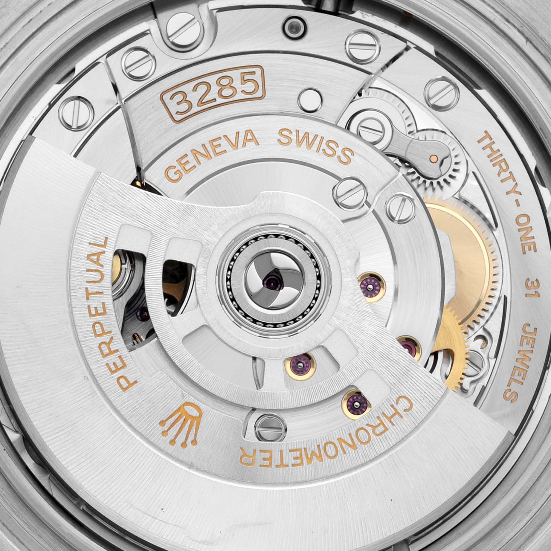 This is a close-up view of the movement inside a Rolex GMT-Master 126720VTNR Men's Stainless Steel Black Dial 126720VTNR Men's Stainless Steel Black Dial watch, showcasing the caliber 3285 movement parts.