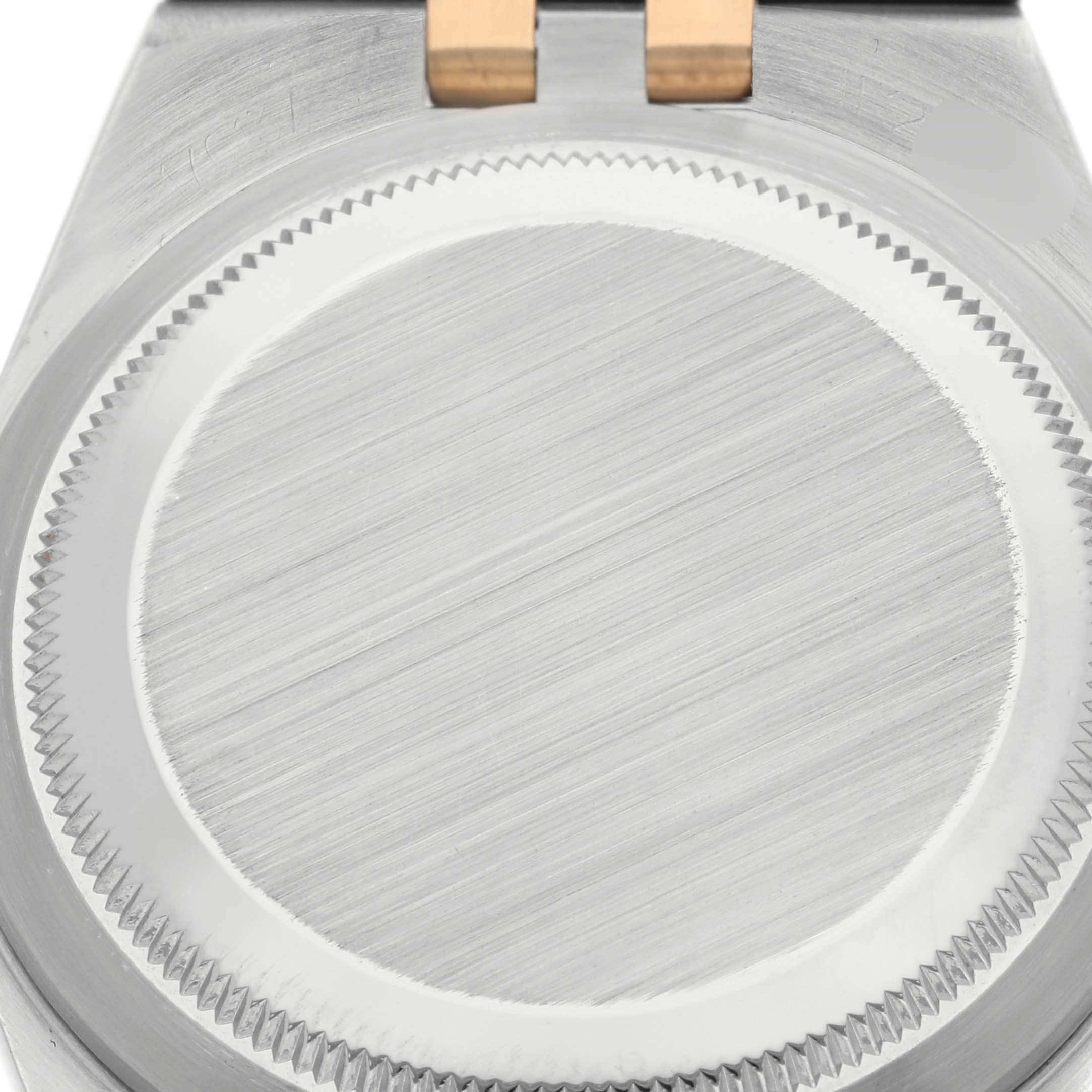 The image shows the case back of a Rolex Oysterquartz 17013 Men
s Steel and Gold (two tone) White Dial 17013 Men
s Steel and Gold (two tone) White Dial model, viewed from the rear angle with a focus on the screw-down case back.