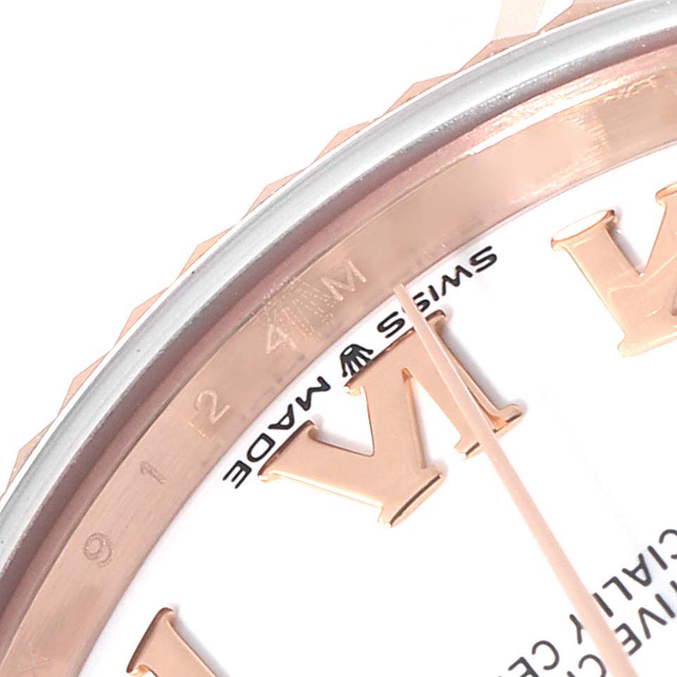 This image shows a close-up of the dial, bezel, and hour markers of a Rolex President 278275 Women's Rose Gold White Dial 278275 Women's Rose Gold White Dial model watch.