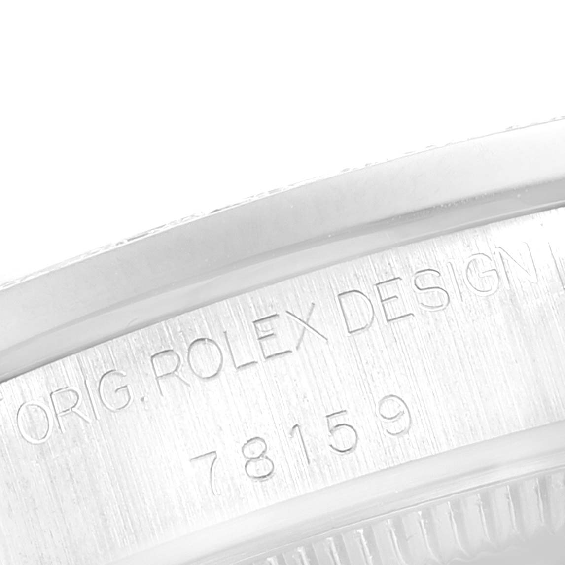 The image shows a close-up of the case back of a Rolex President 78159 Women's White Gold Silver Dial 78159 Women's White Gold Silver Dial model, displaying the engraved design number.