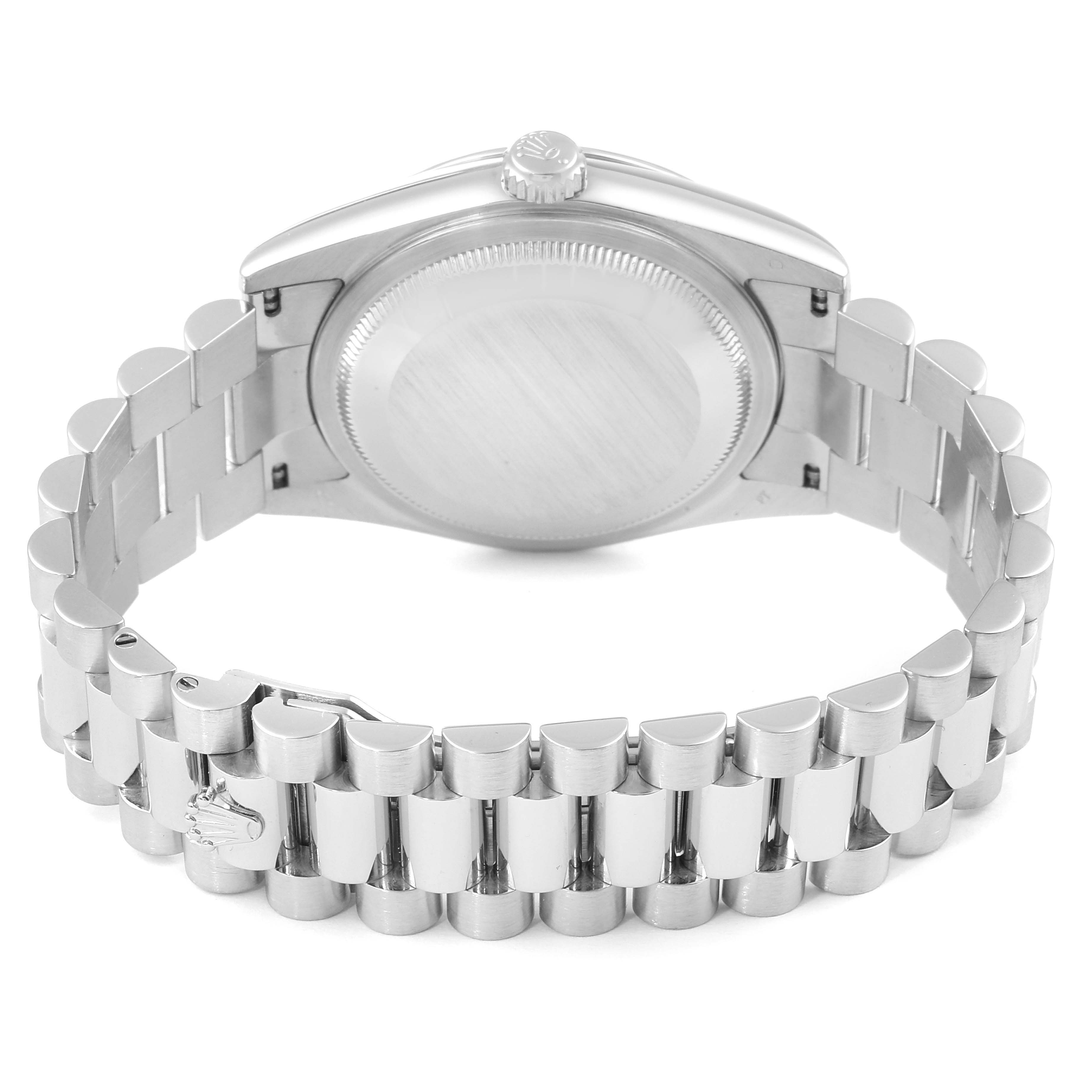 The image shows the back view of a Rolex President 118206 Men's White Gold Blue Dial 118206 Men's White Gold Blue Dial model watch, focusing on the case back and the bracelet with the clasp.