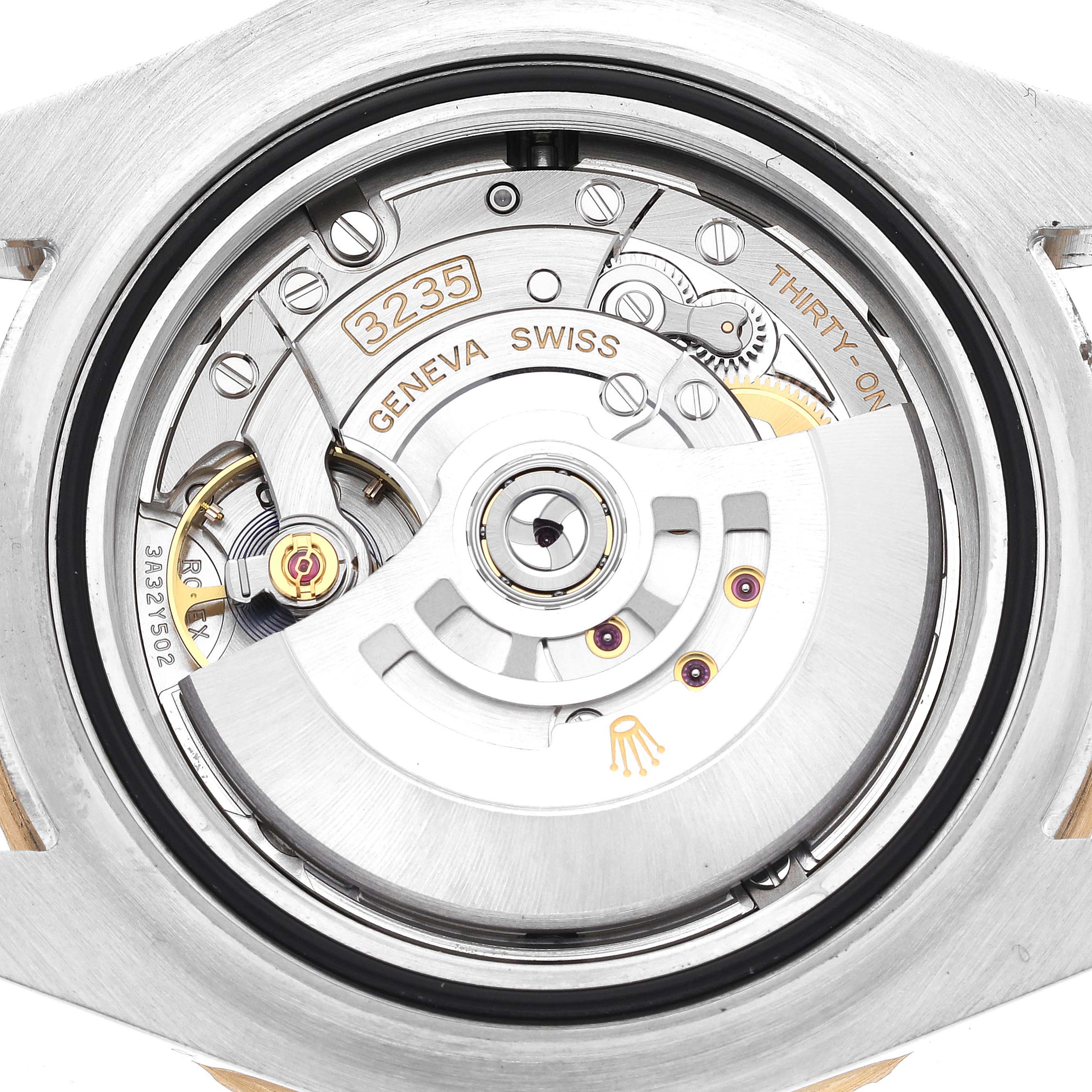 The image shows the Rolex Sea-Dweller 126603 Men
s Steel and Gold (two tone) Black Dial 126603 Men
s Steel and Gold (two tone) Black Dial watch movement, specifically the automatic rotor and gears, viewed from the back.