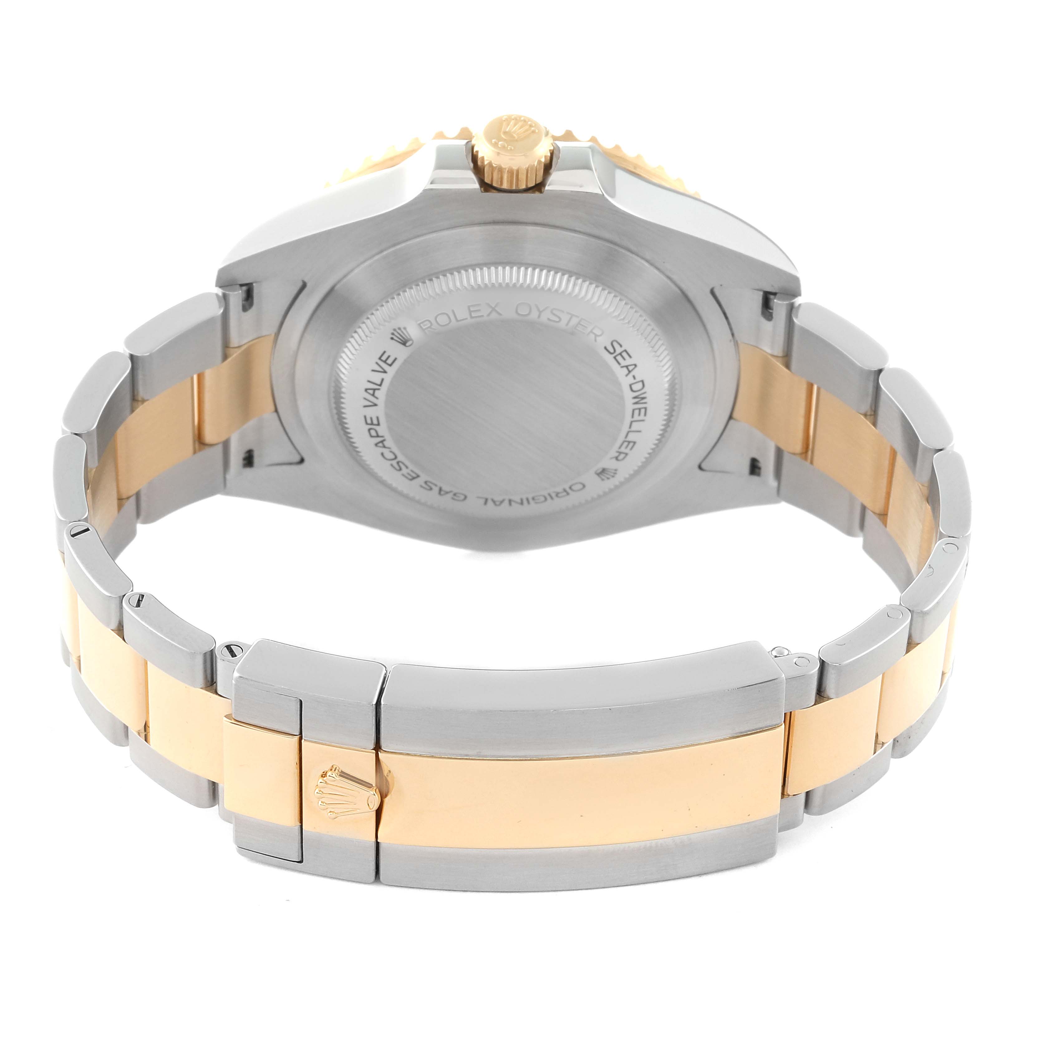 This image shows the back view and clasp of the Rolex Sea-Dweller 126603 Men
s Steel and Gold (two tone) Black Dial 126603 Men
s Steel and Gold (two tone) Black Dial watch, highlighting its two-tone bracelet and case back.