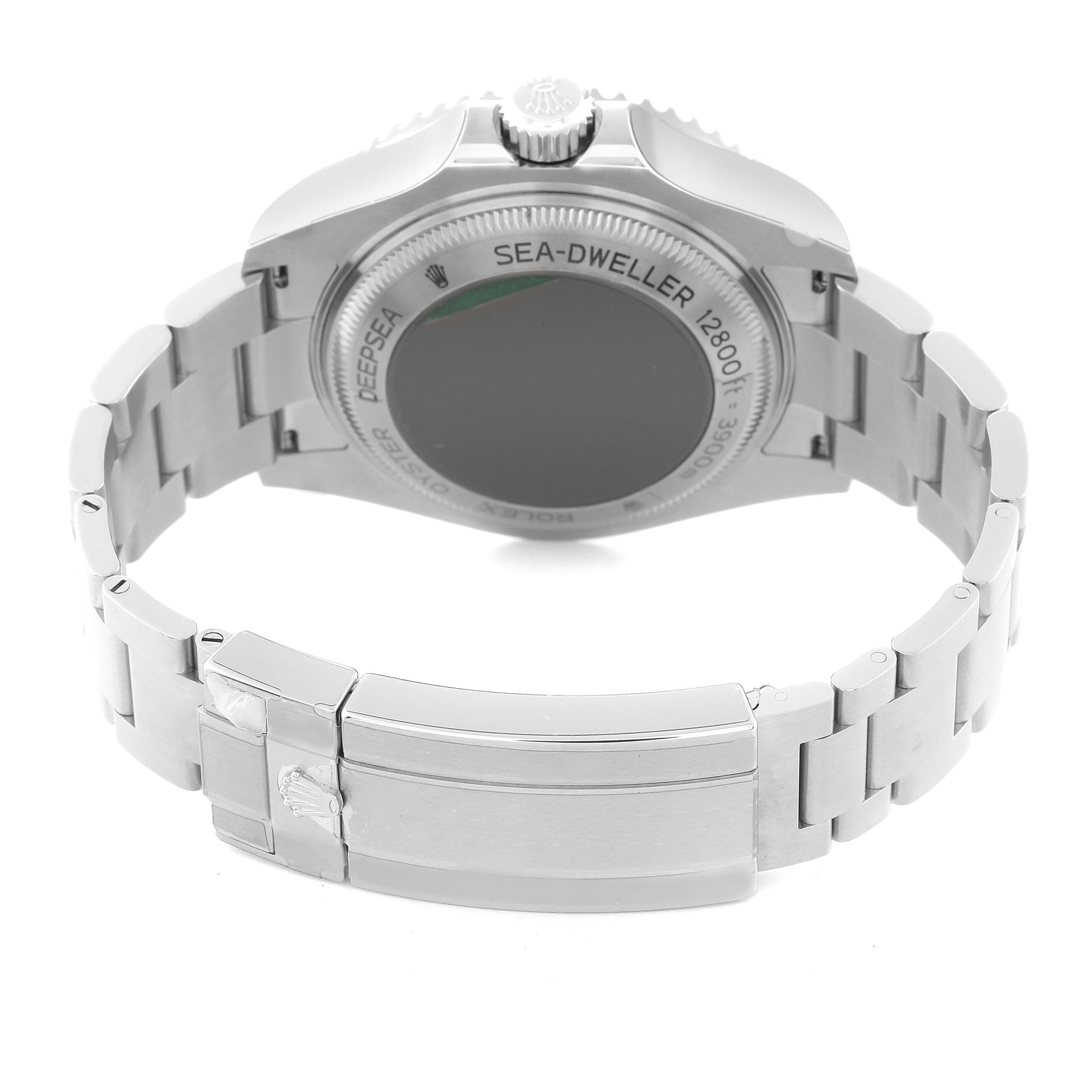 The image shows the back case and clasp of a Rolex Sea-Dweller M126660-0002 Men
s Stainless Steel Blue Dial M126660-0002 Men
s Stainless Steel Blue Dial watch from a rear angle.