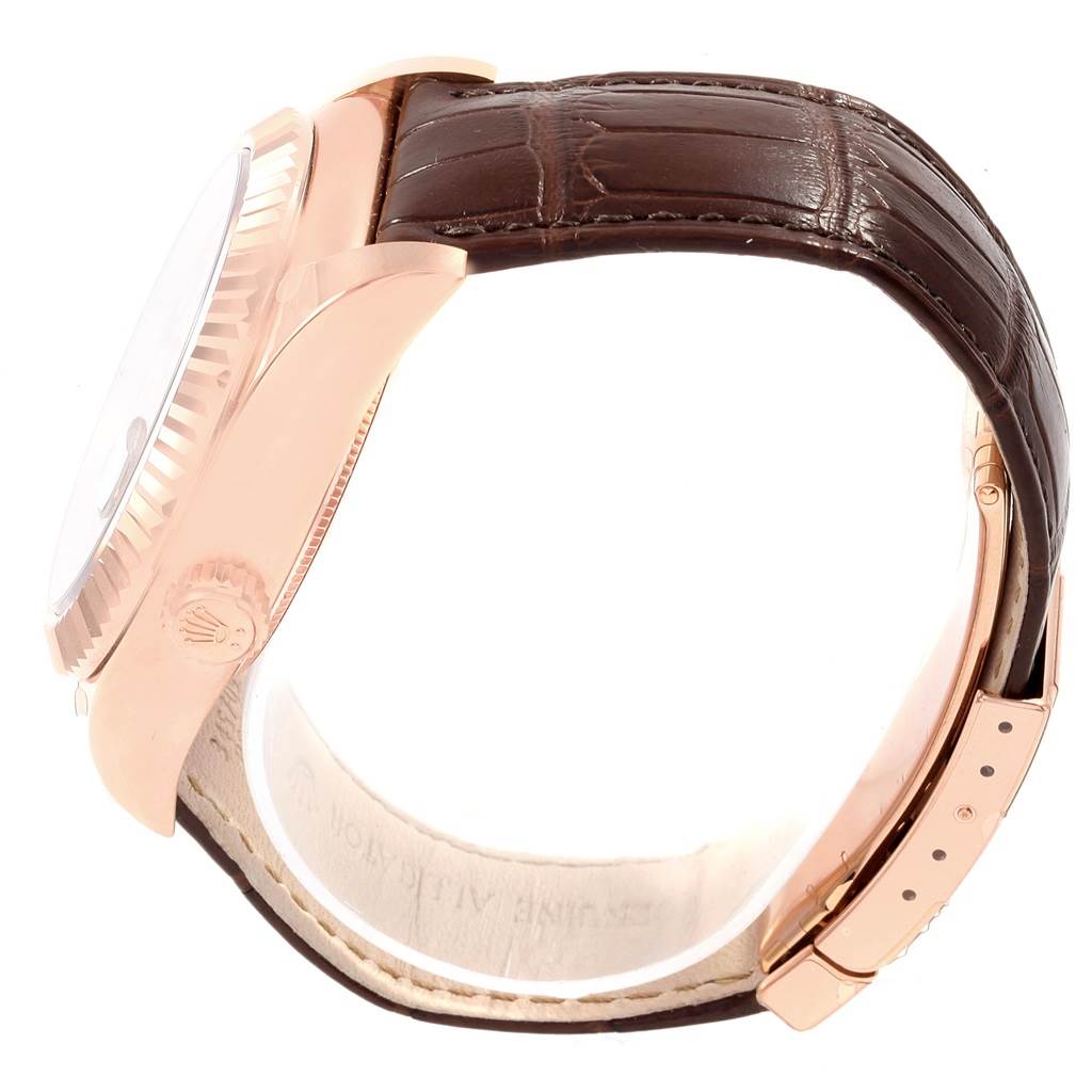 The image shows a side view of a Rolex Sky-Dweller 326135 Men's Rose Gold Brown Dial 326135 Men's Rose Gold Brown Dial watch with a brown leather strap and visible crown.