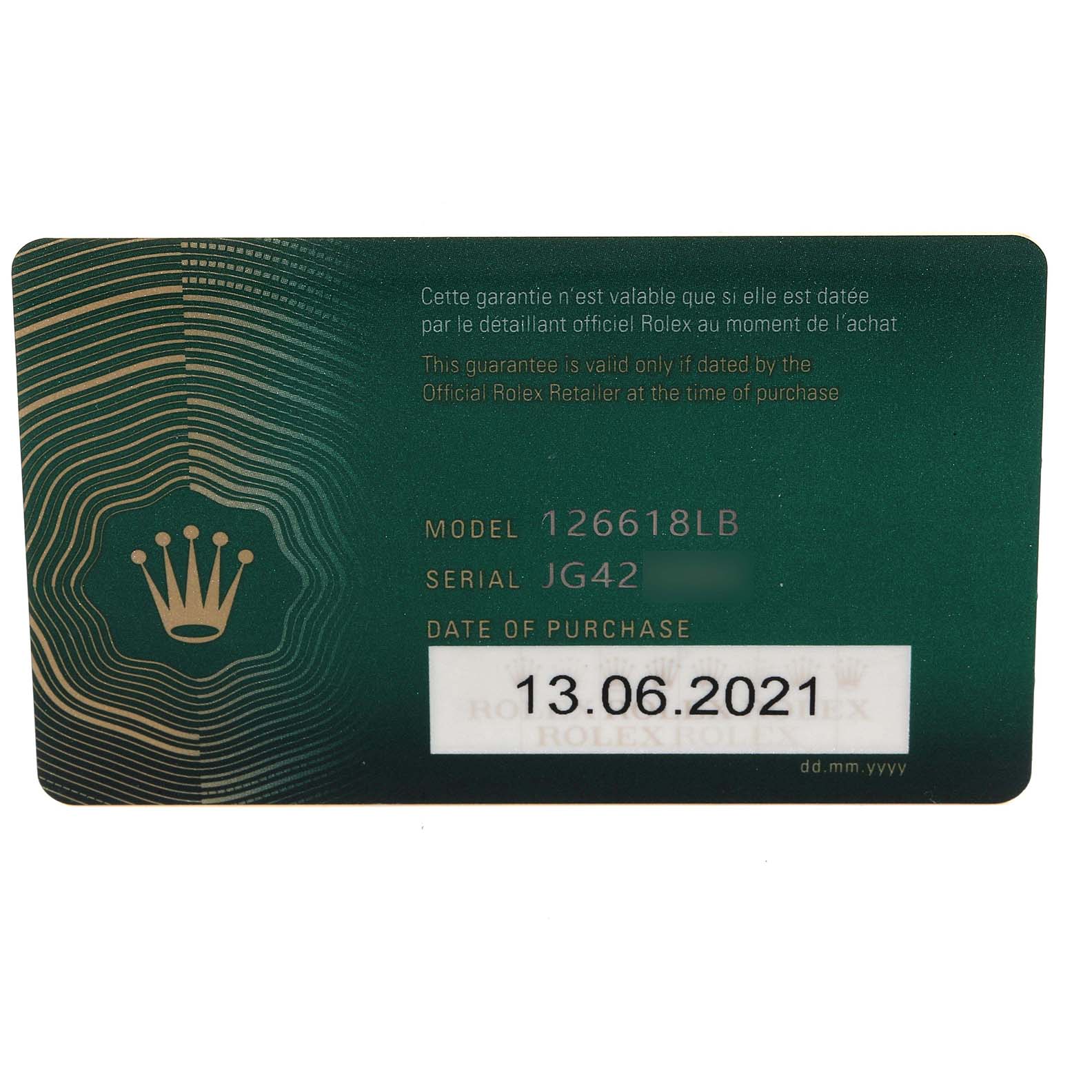 The image shows a close-up view of an official guarantee card for a Rolex Submariner 126618LB Men's Yellow Gold Blue Dial 126618LB Men's Yellow Gold Blue Dial model 126618LB, with purchase date 13.06.2021.