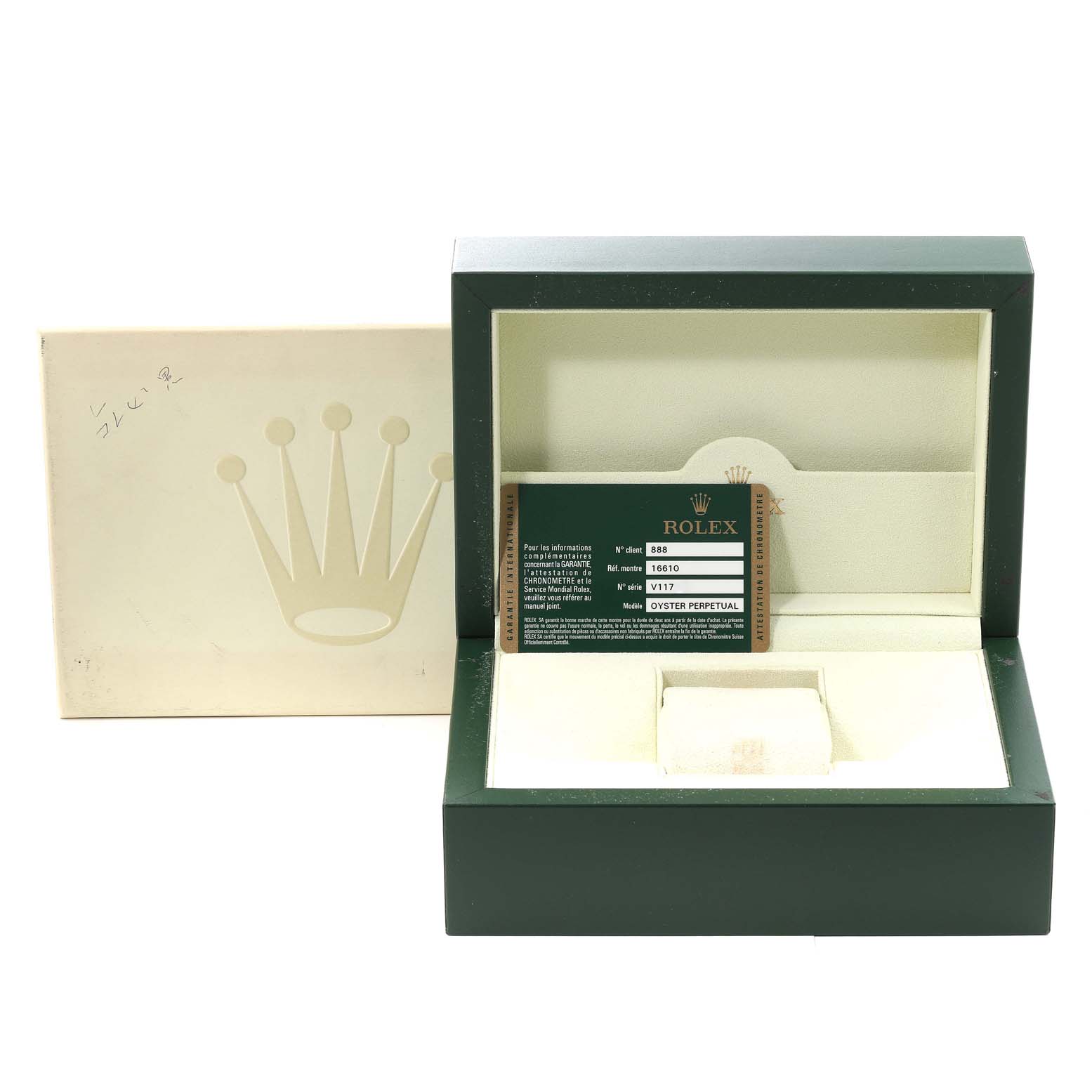 This image shows an open Rolex box for a Submariner model, including a certification card.