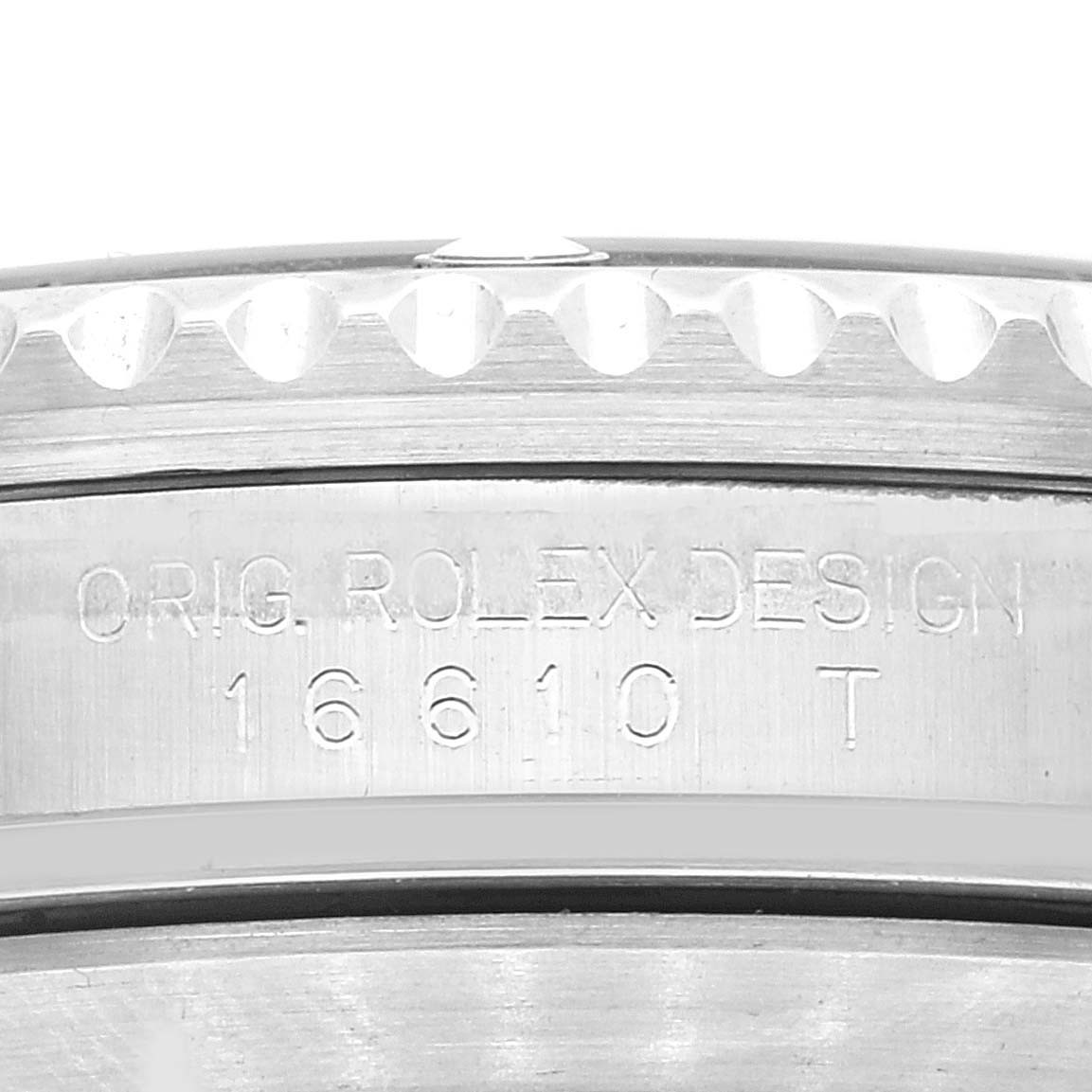 The close-up image shows the engraved side of the case of a Rolex Submariner 16610 Men
s Stainless Steel Black Dial 16610 Men
s Stainless Steel Black Dial model with design number 16610.