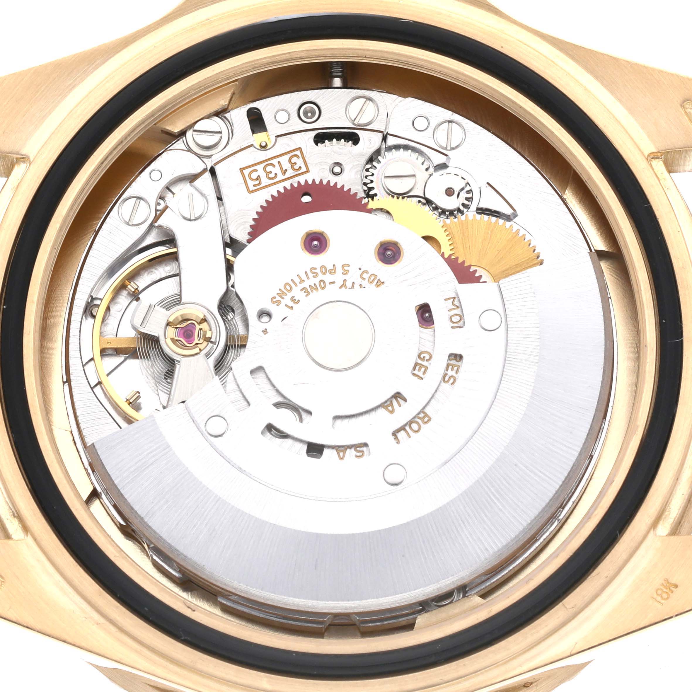 This image shows the inner mechanism and movement parts of a Rolex Submariner 16618 Men's Yellow Gold Black Dial 16618 Men's Yellow Gold Black Dial watch from a back view angle.