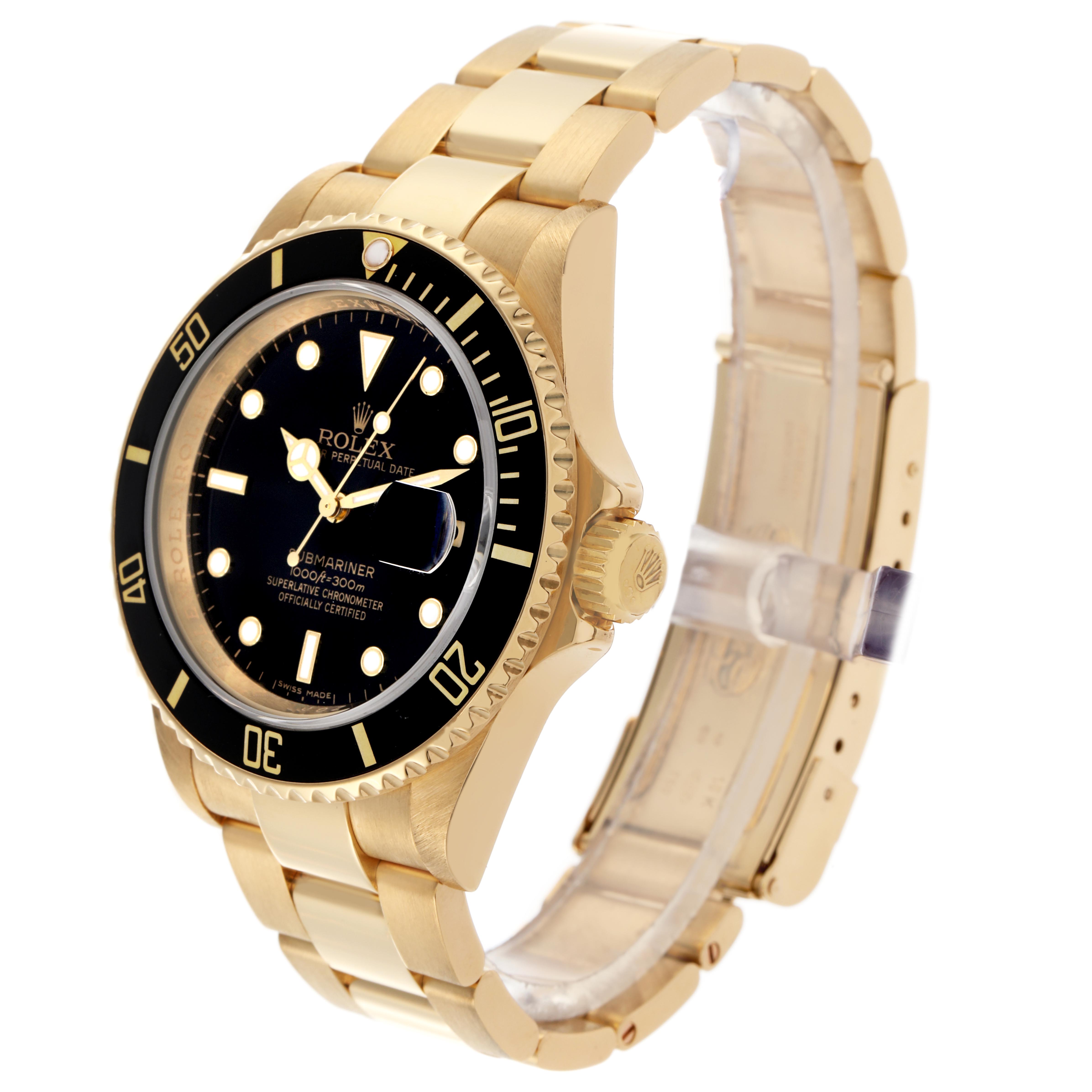The Rolex Submariner 16618 Men's Yellow Gold Black Dial 16618 Men's Yellow Gold Black Dial watch is shown at an angle displaying the face, bezel, crown, and part of the bracelet.