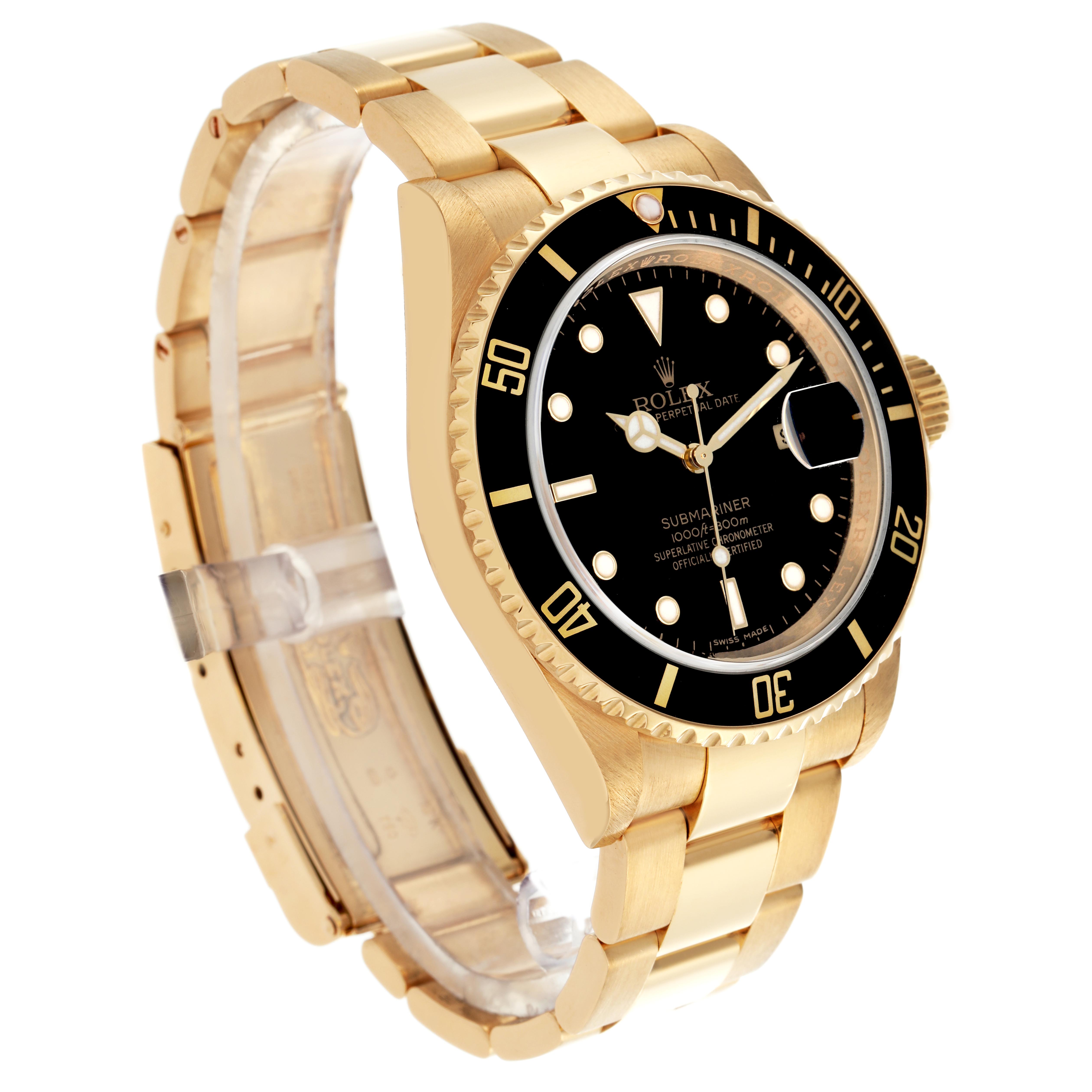 The Rolex Submariner 16618 Men's Yellow Gold Black Dial 16618 Men's Yellow Gold Black Dial watch is shown at a three-quarter angle, displaying the bracelet, bezel, and dial.