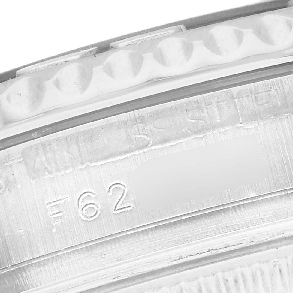 This close-up image shows the bezel and serial number on a Rolex Yacht-Master 168622 Men's Stainless Steel Silver Dial 168622 Men's Stainless Steel Silver Dial watch.