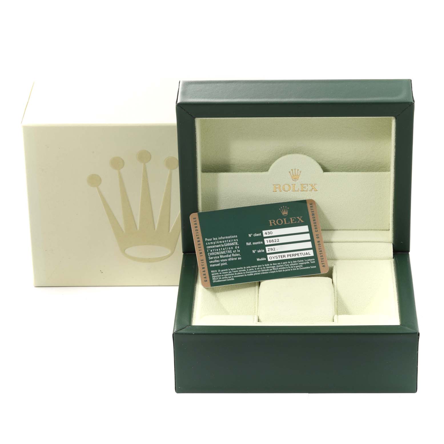The image shows the open box and warranty card for a Rolex Yacht-Master 16622 Men's Stainless Steel Silver Dial 16622 Men's Stainless Steel Silver Dial watch.