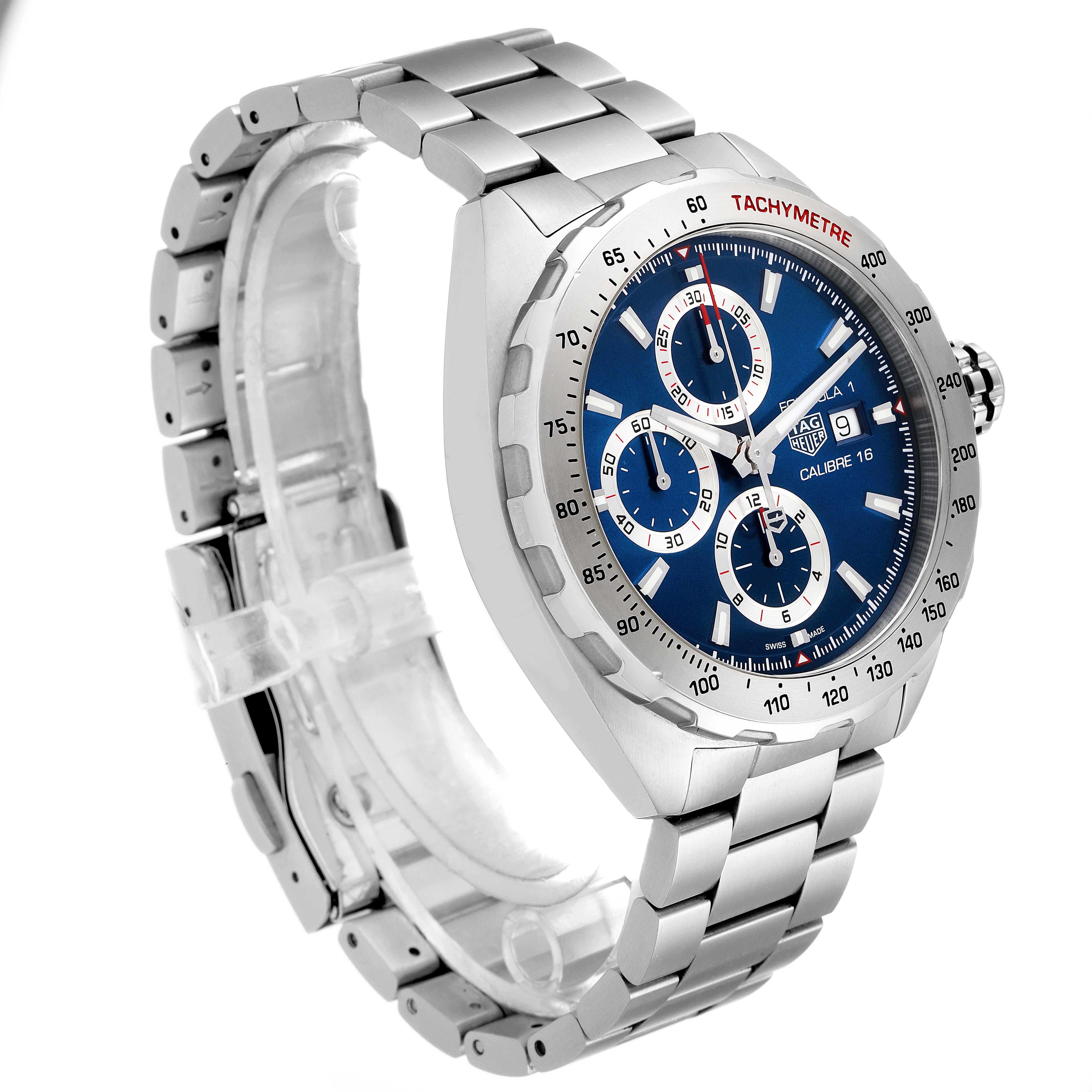 The image shows a Tag Heuer Formula 1 CAZ2015.BA0876 Men's Stainless Steel Blue Dial CAZ2015.BA0876 Men's Stainless Steel Blue Dial watch at a three-quarter angle, highlighting its blue dial, tachymeter bezel, and stainless steel bracelet.